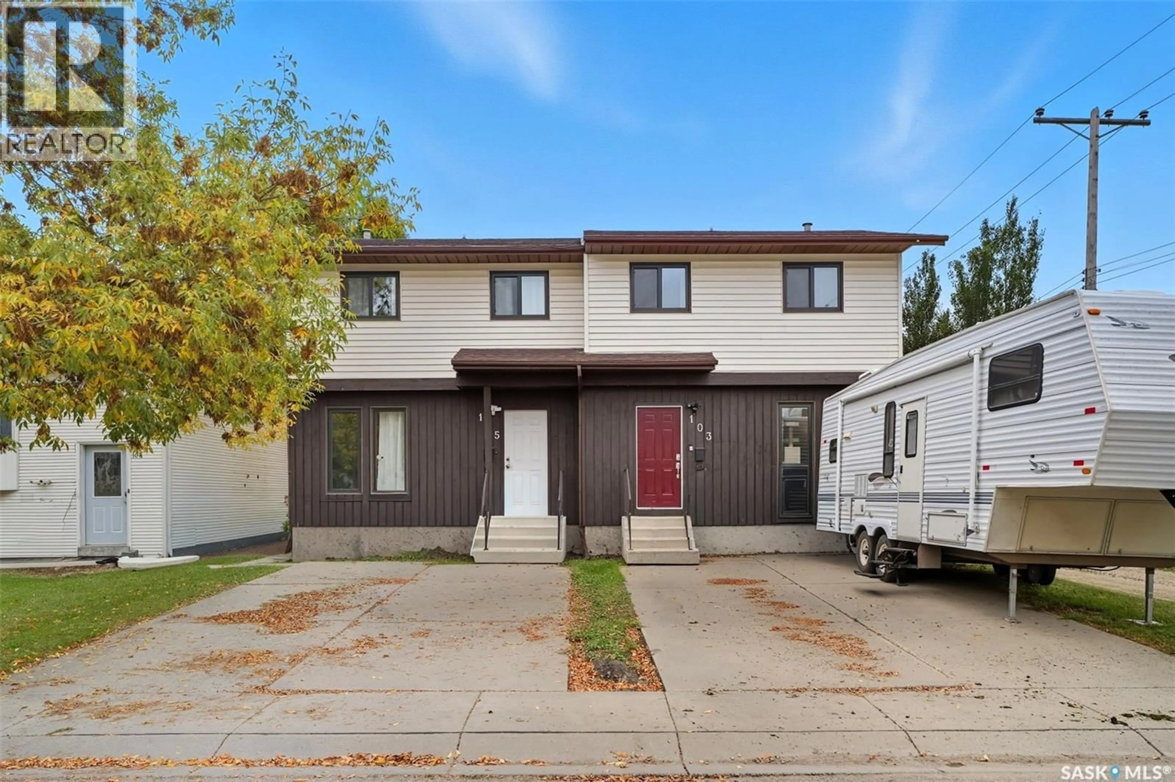 Home with vinyl exterior material, street for 103 & 105 HEDLEY STREET, Saskatoon Saskatchewan S7N4G4
