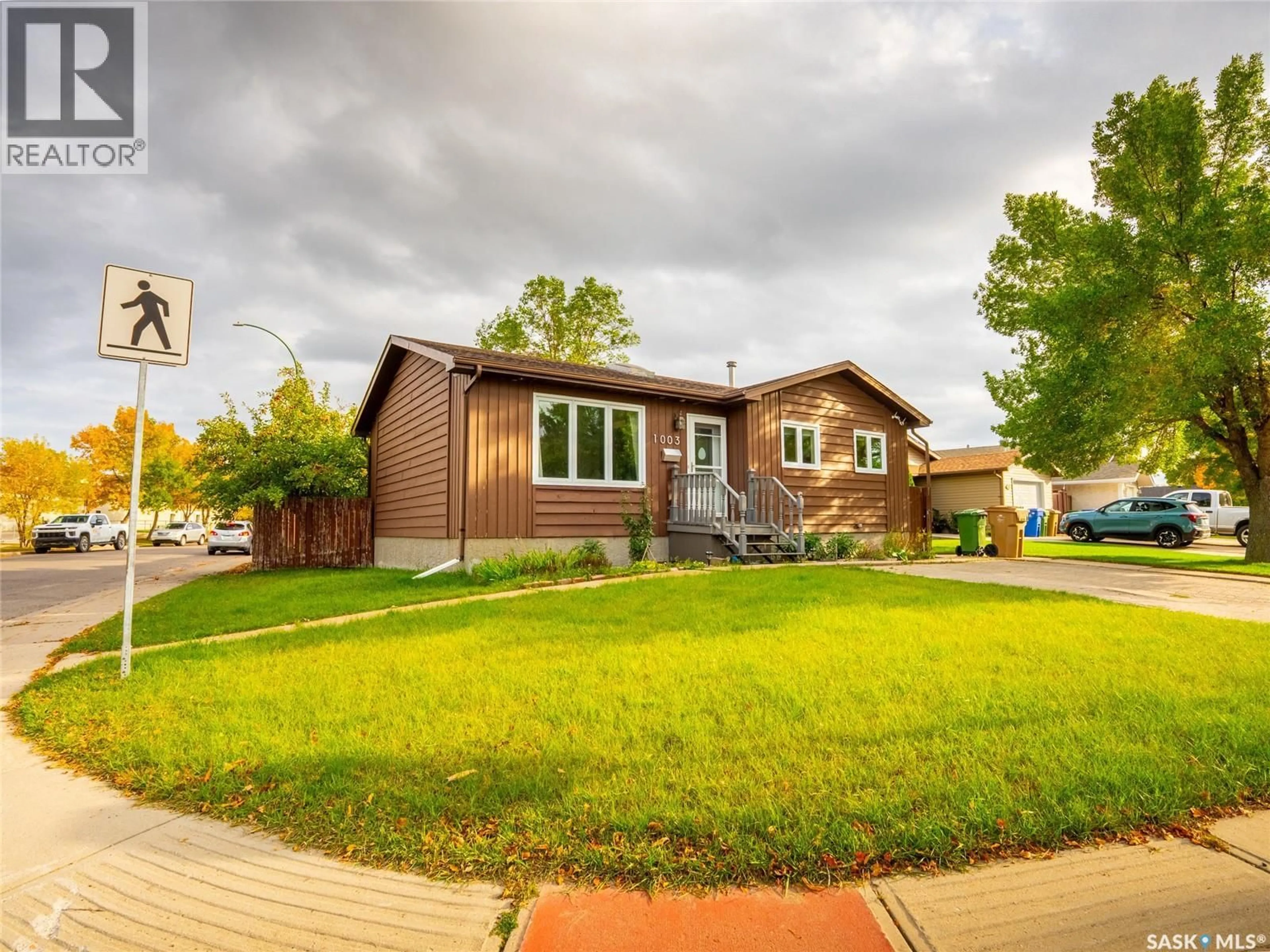 Home with brick exterior material, street for 1003 BAYDA CRESCENT, Regina Saskatchewan S4N6Y3
