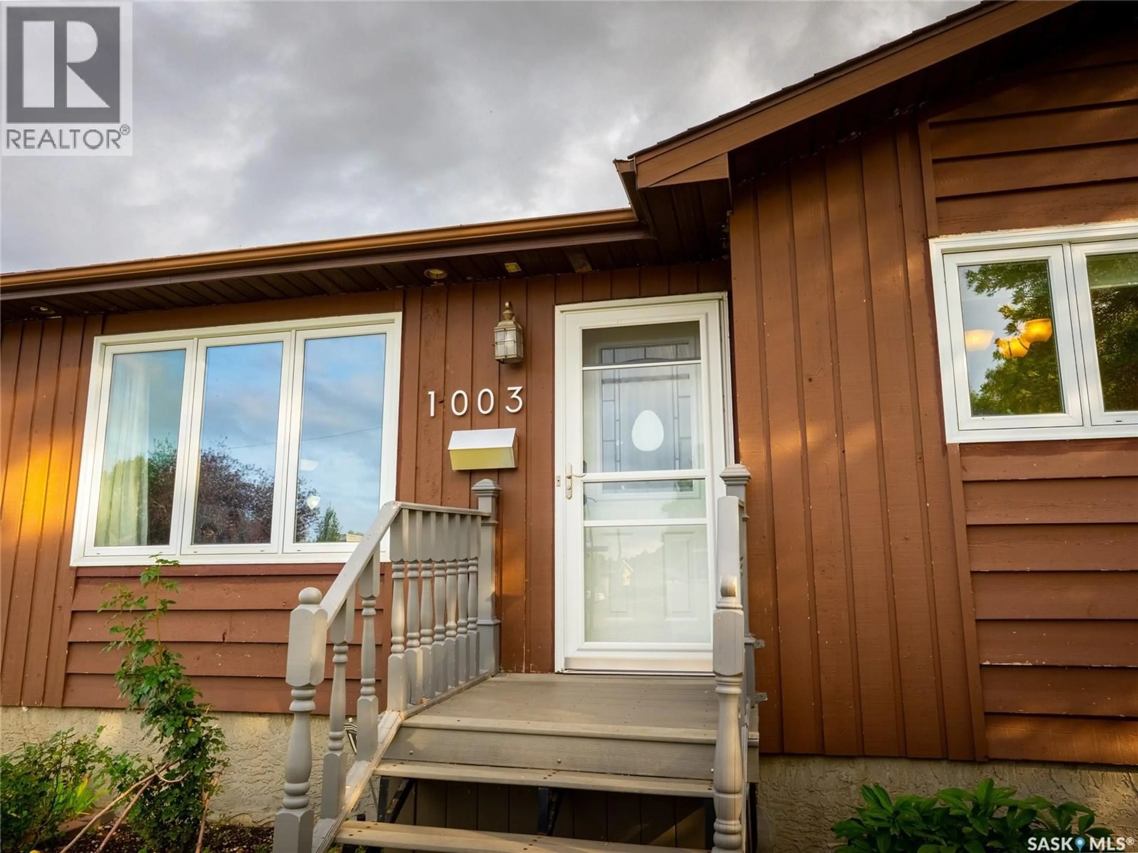 Home with vinyl exterior material, street for 1003 BAYDA CRESCENT, Regina Saskatchewan S4N6Y3
