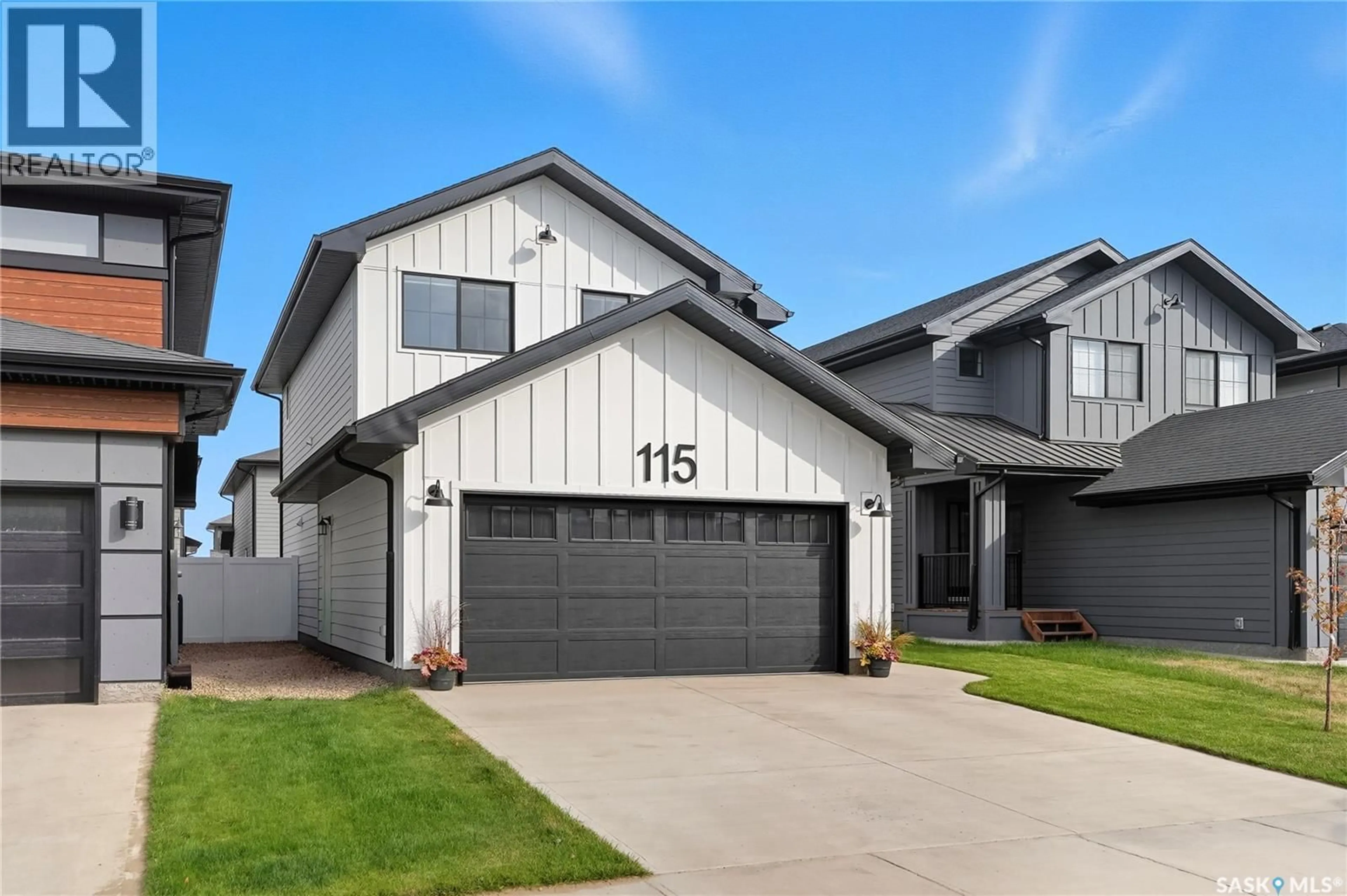 Home with vinyl exterior material, street for 115 LESKIW LANE, Saskatoon Saskatchewan S7V1R4