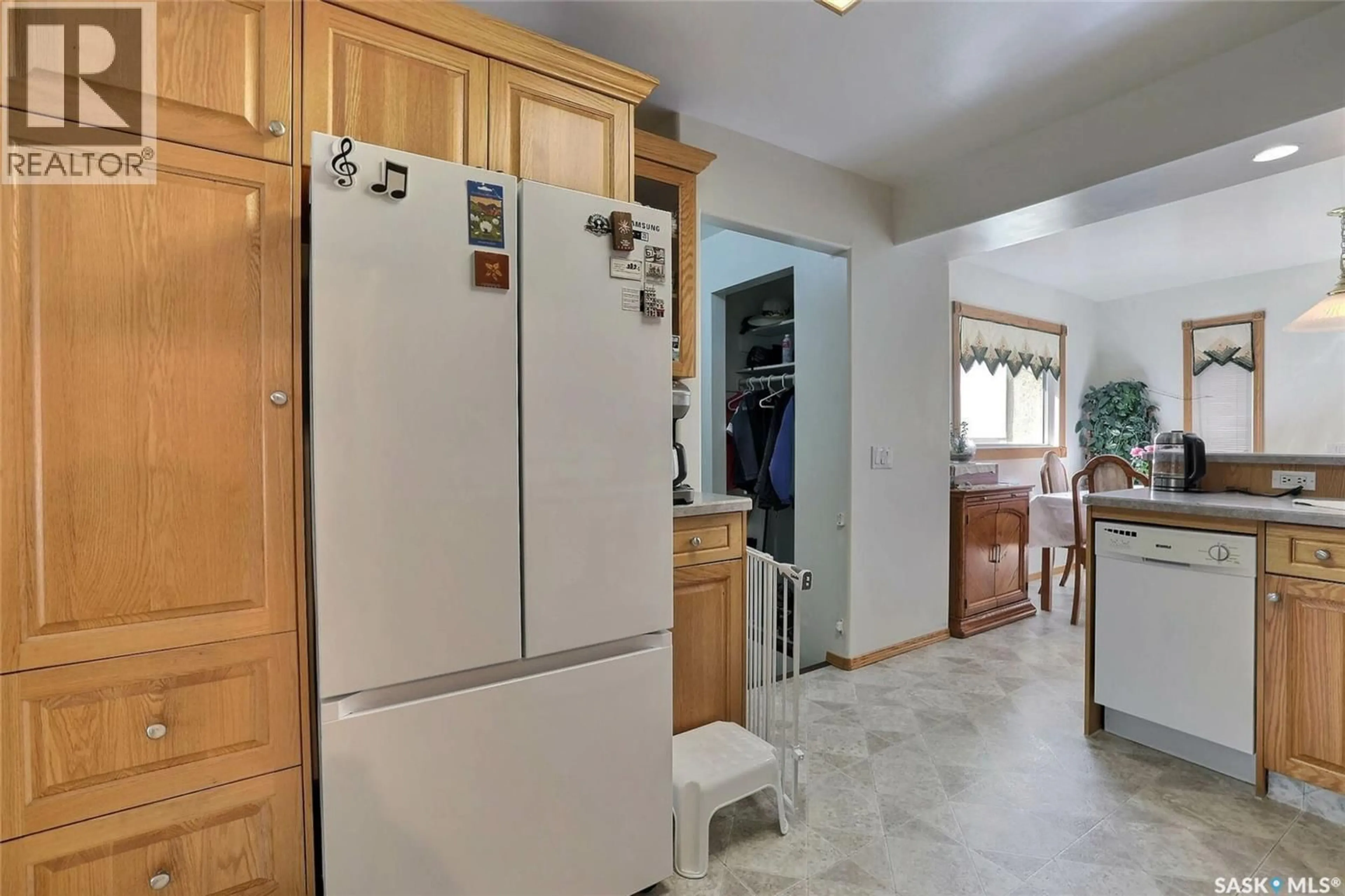 Kitchen with laundary machines, ceramic/tile floor for 2812 FLEURY STREET, Regina Saskatchewan S4N2M4