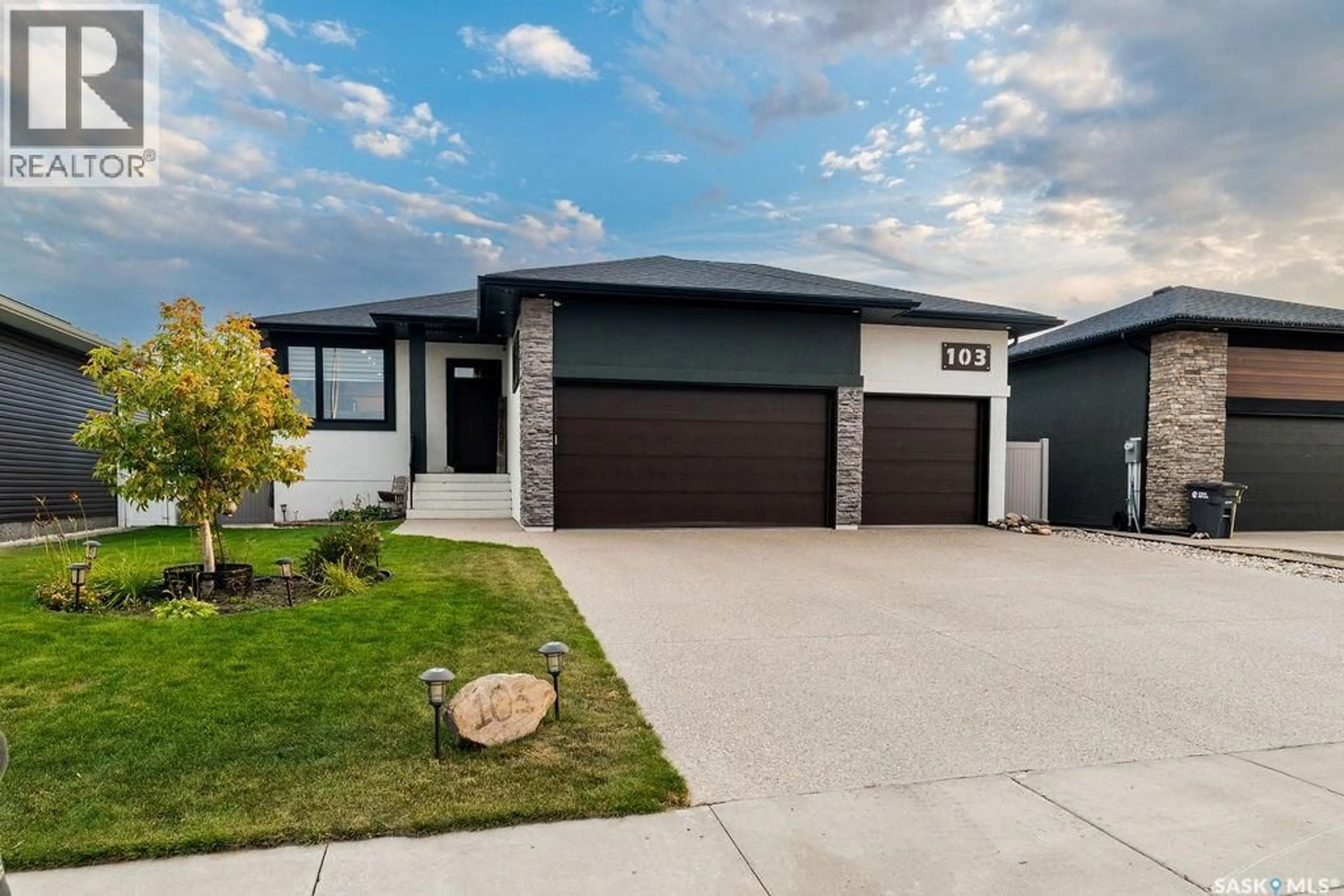 Home with vinyl exterior material, street for 103 VESTOR DRIVE, Pilot Butte Saskatchewan S0G3Z0