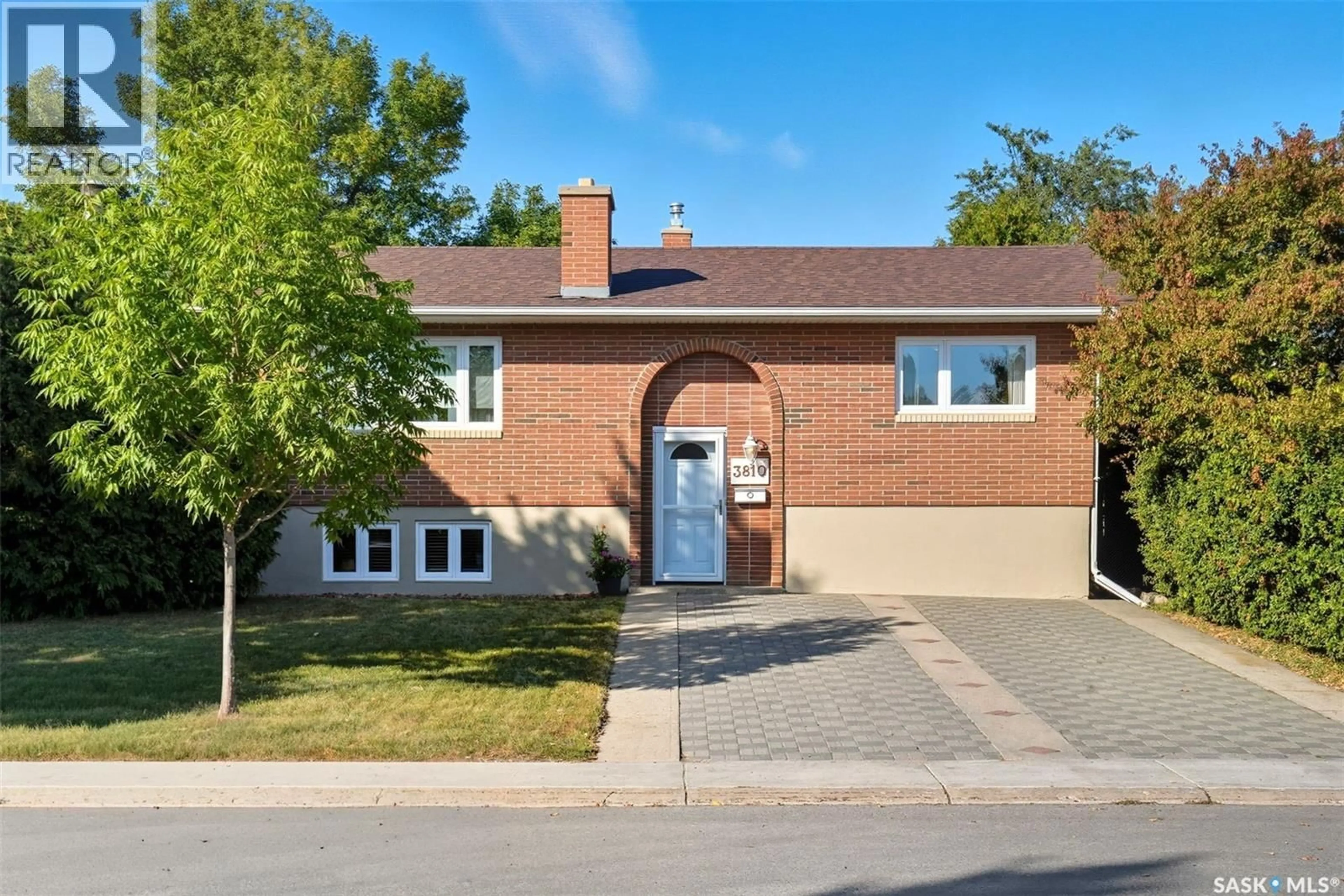 Home with brick exterior material, street for 3810 CENTENNIAL DRIVE, Saskatoon Saskatchewan S7L5K7