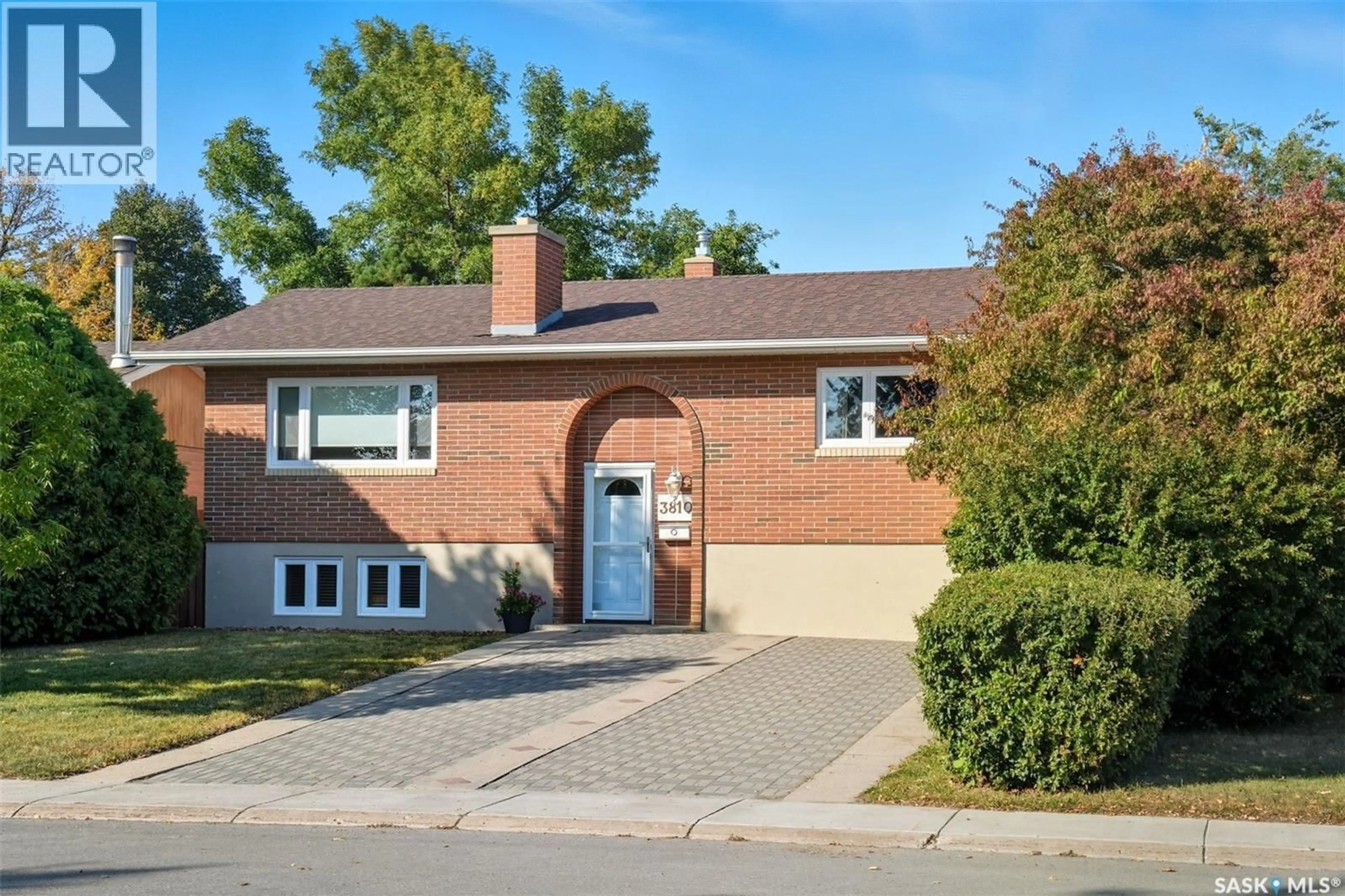 Home with brick exterior material, street for 3810 CENTENNIAL DRIVE, Saskatoon Saskatchewan S7L5K7