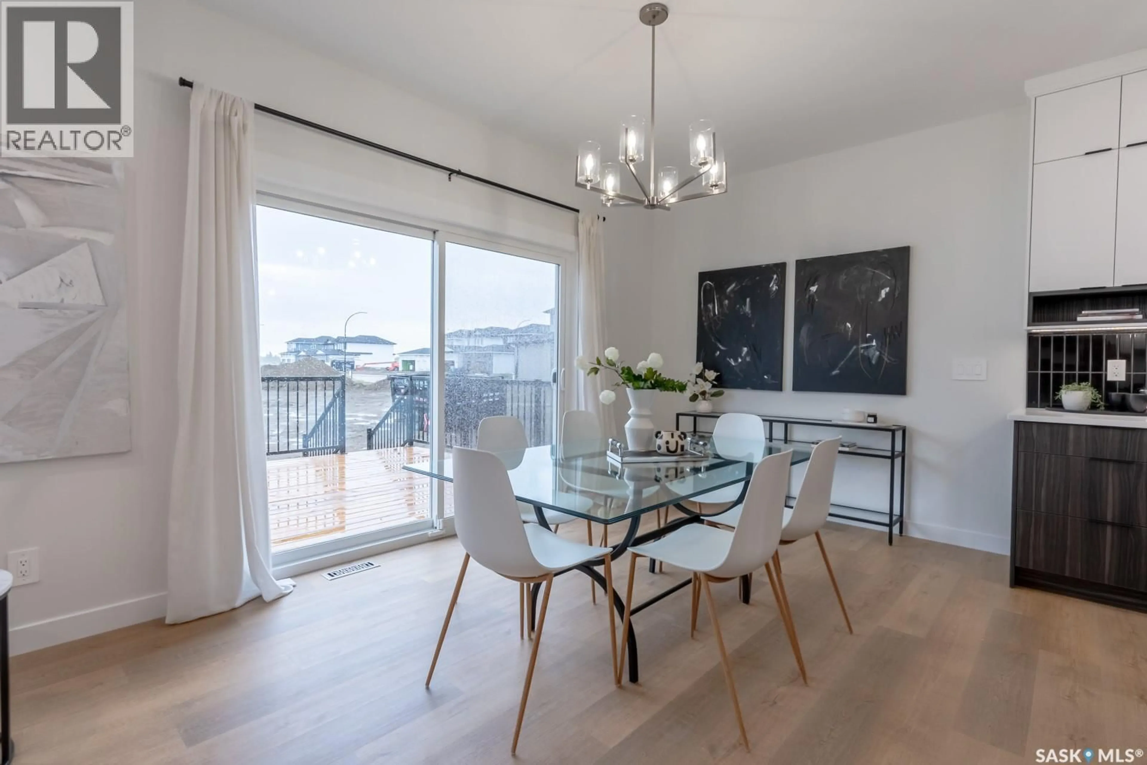 Dining room, wood/laminate floor for 131 TRAEGER COMMON, Saskatoon Saskatchewan S7V1R3