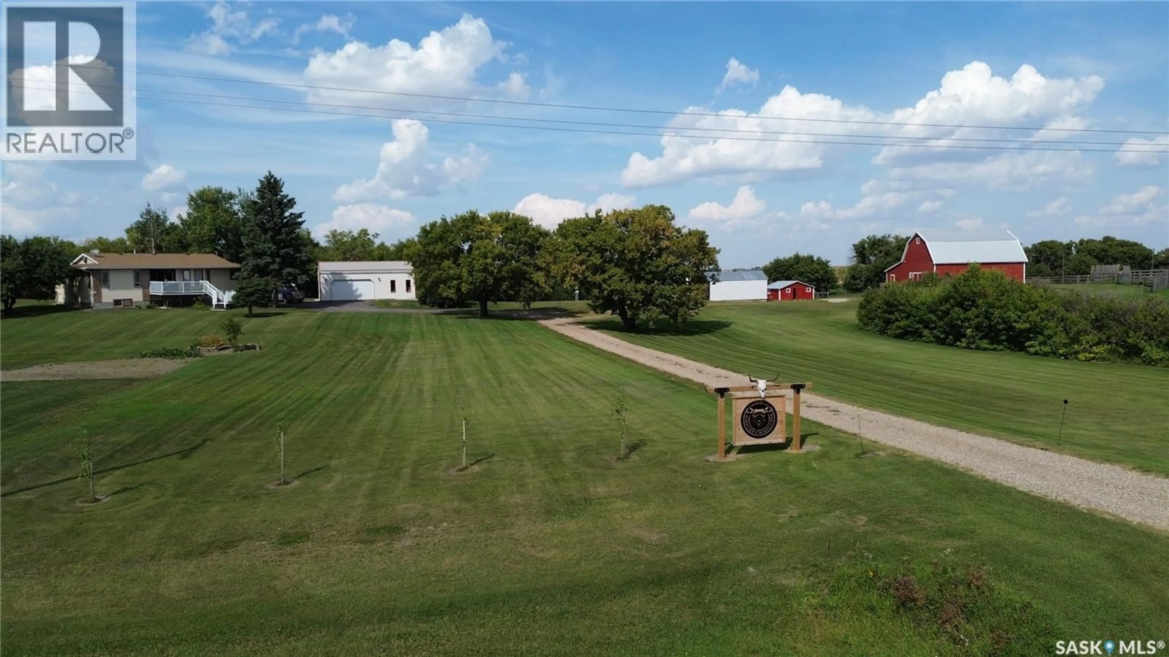 A pic from outside/outdoor area/front of a property/back of a property/a pic from drone, building for DIAMOND C ACREAGE, Fertile Belt Rm No. 183 Saskatchewan S0A3Y0
