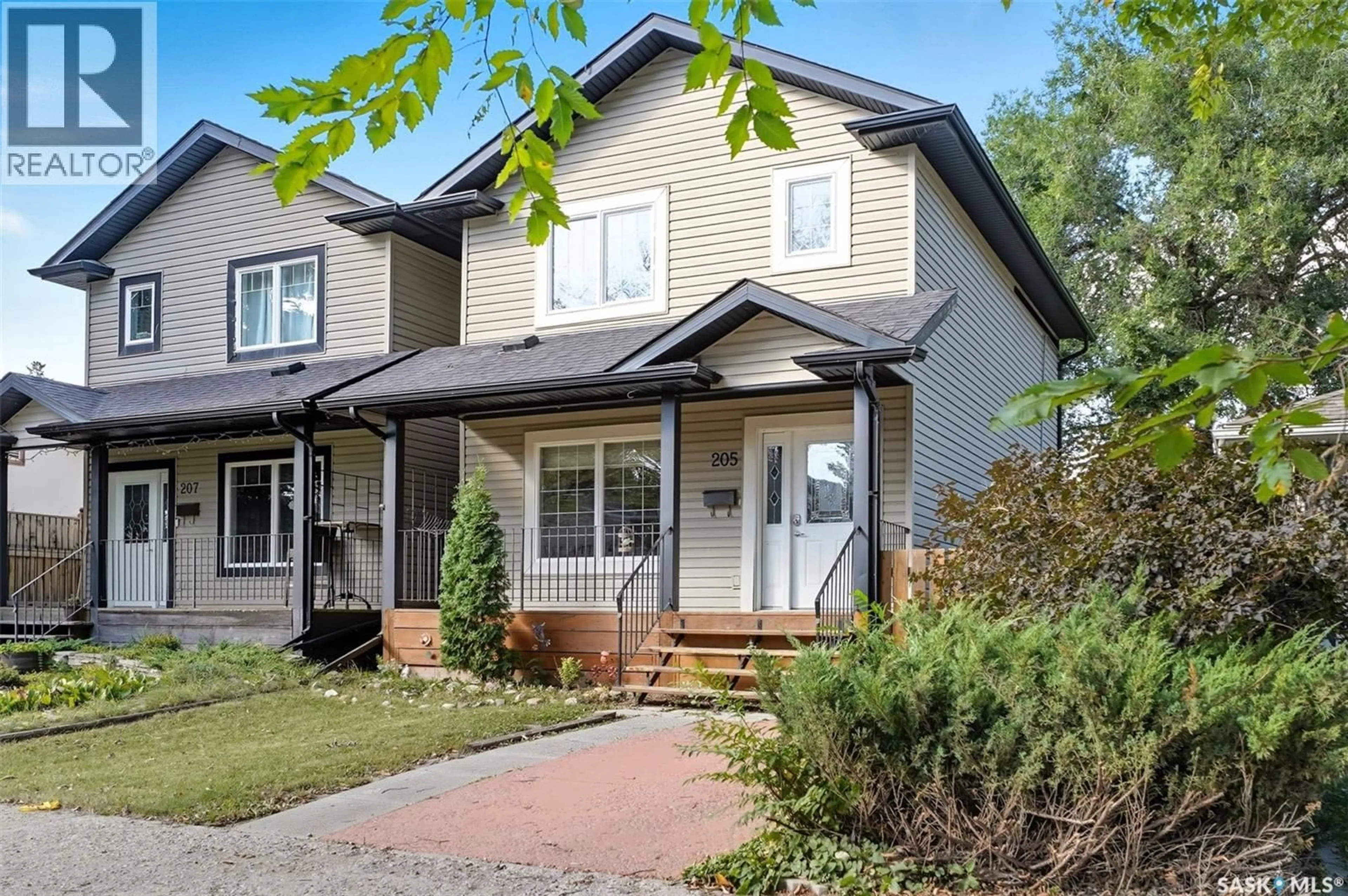 Home with brick exterior material, street for 205 TAYLOR STREET, Saskatoon Saskatchewan S7M0C4
