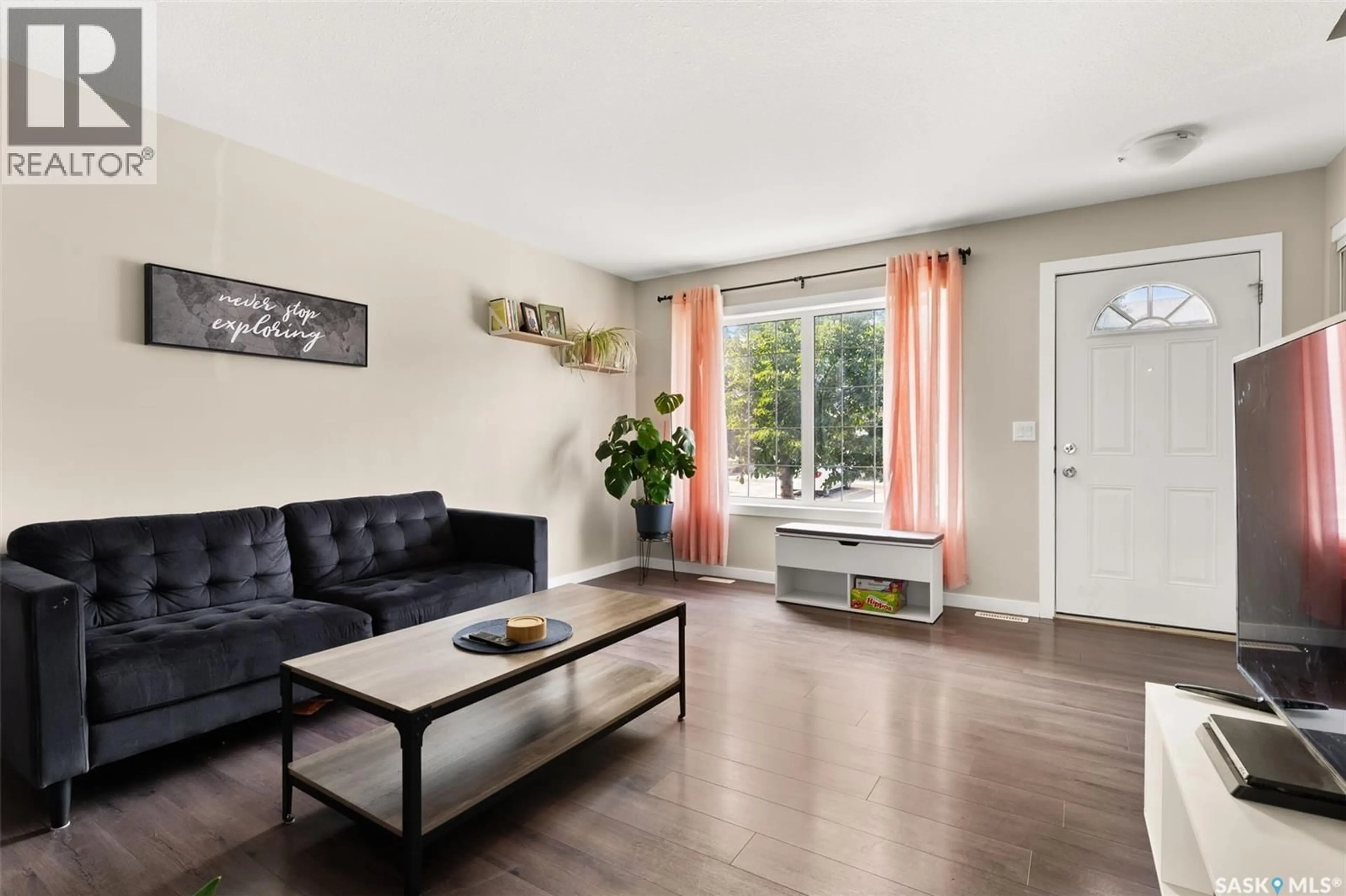 Living room with furniture, unknown for 3748 7TH AVE, Regina Saskatchewan S4N7R4