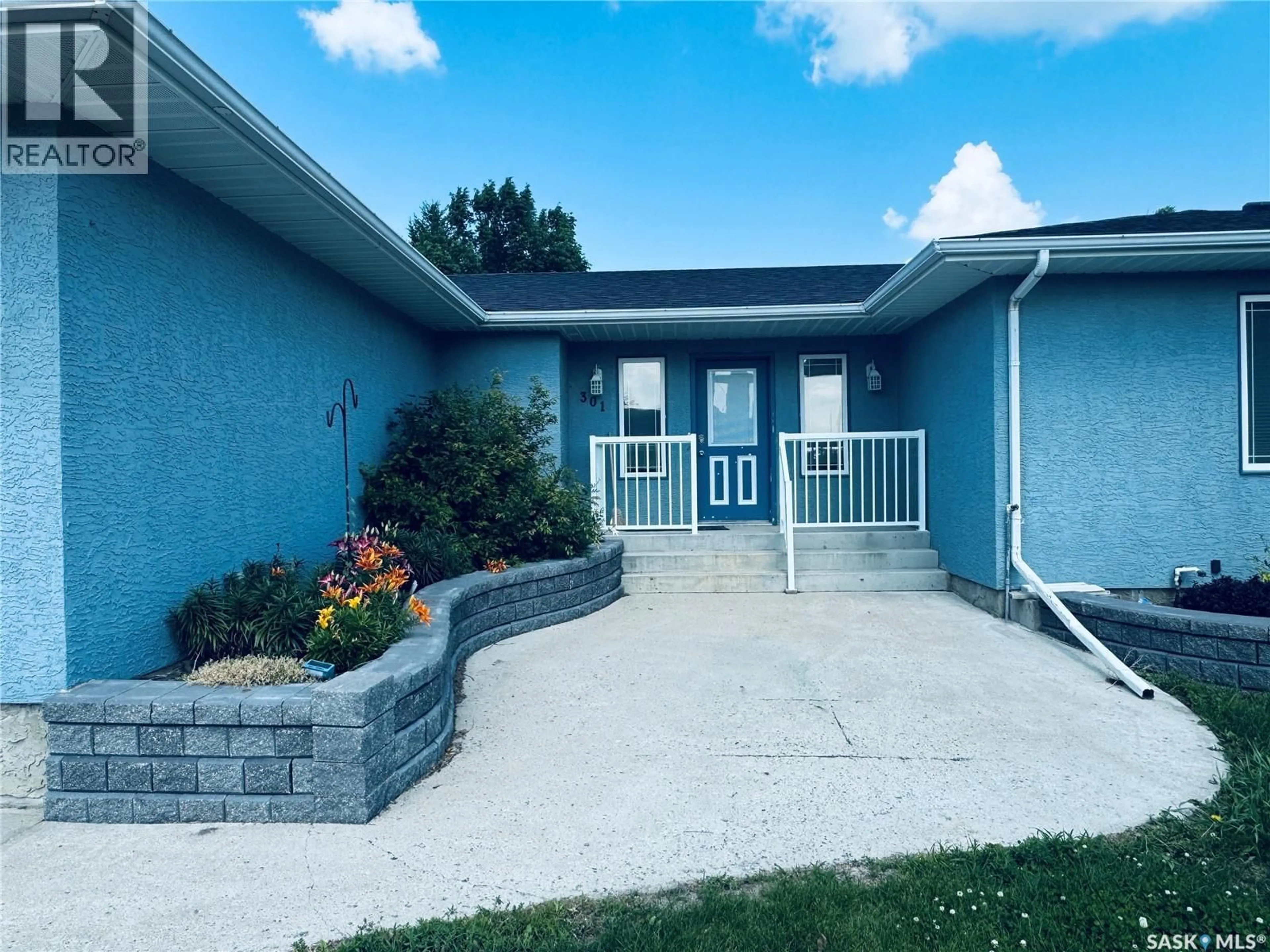 Home with vinyl exterior material, unknown for 301 TURNBULL AVENUE, Biggar Saskatchewan S0K0M0