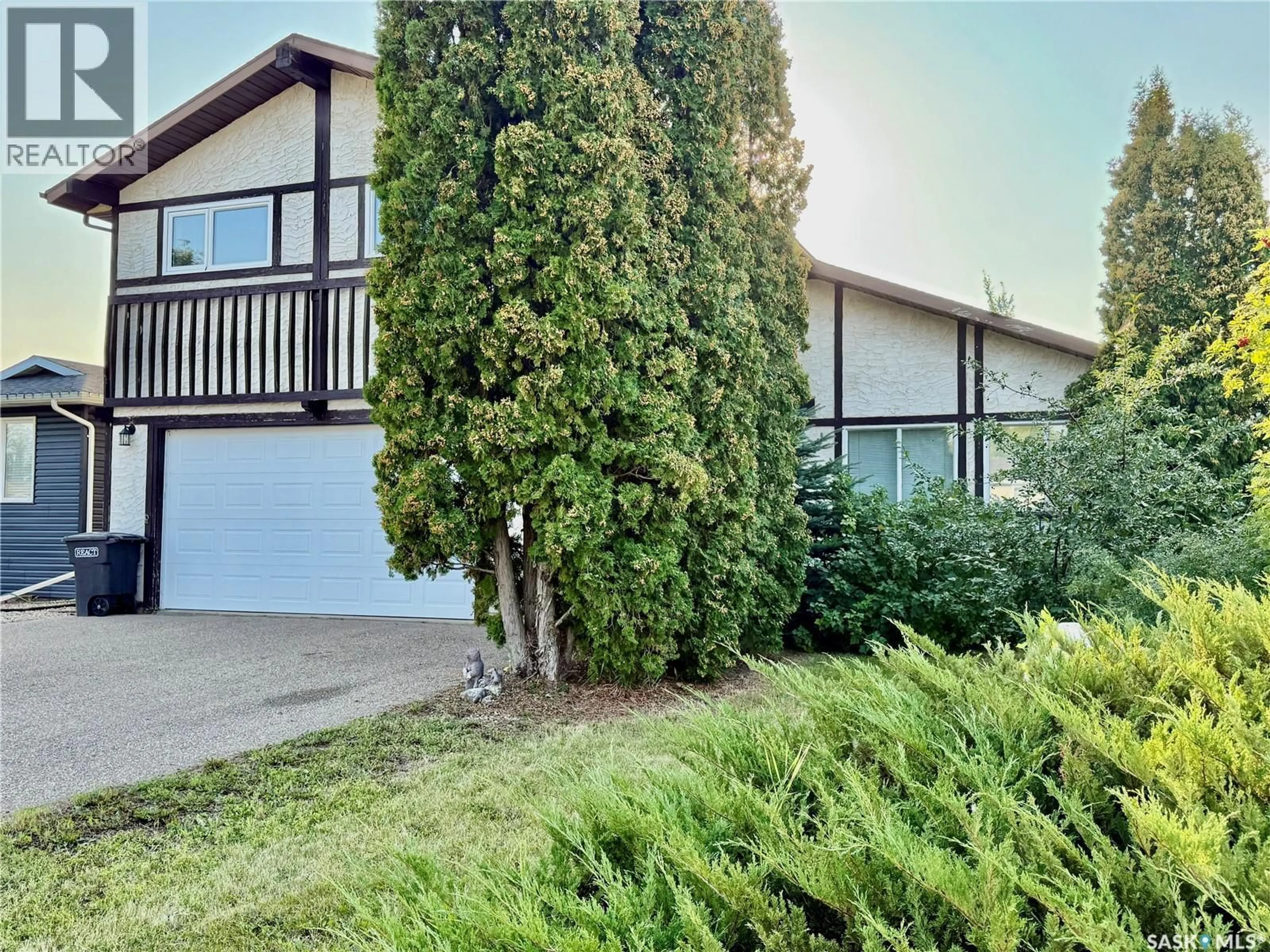 Home with vinyl exterior material, street for 1107 16TH STREET, Humboldt Saskatchewan S0K2A0