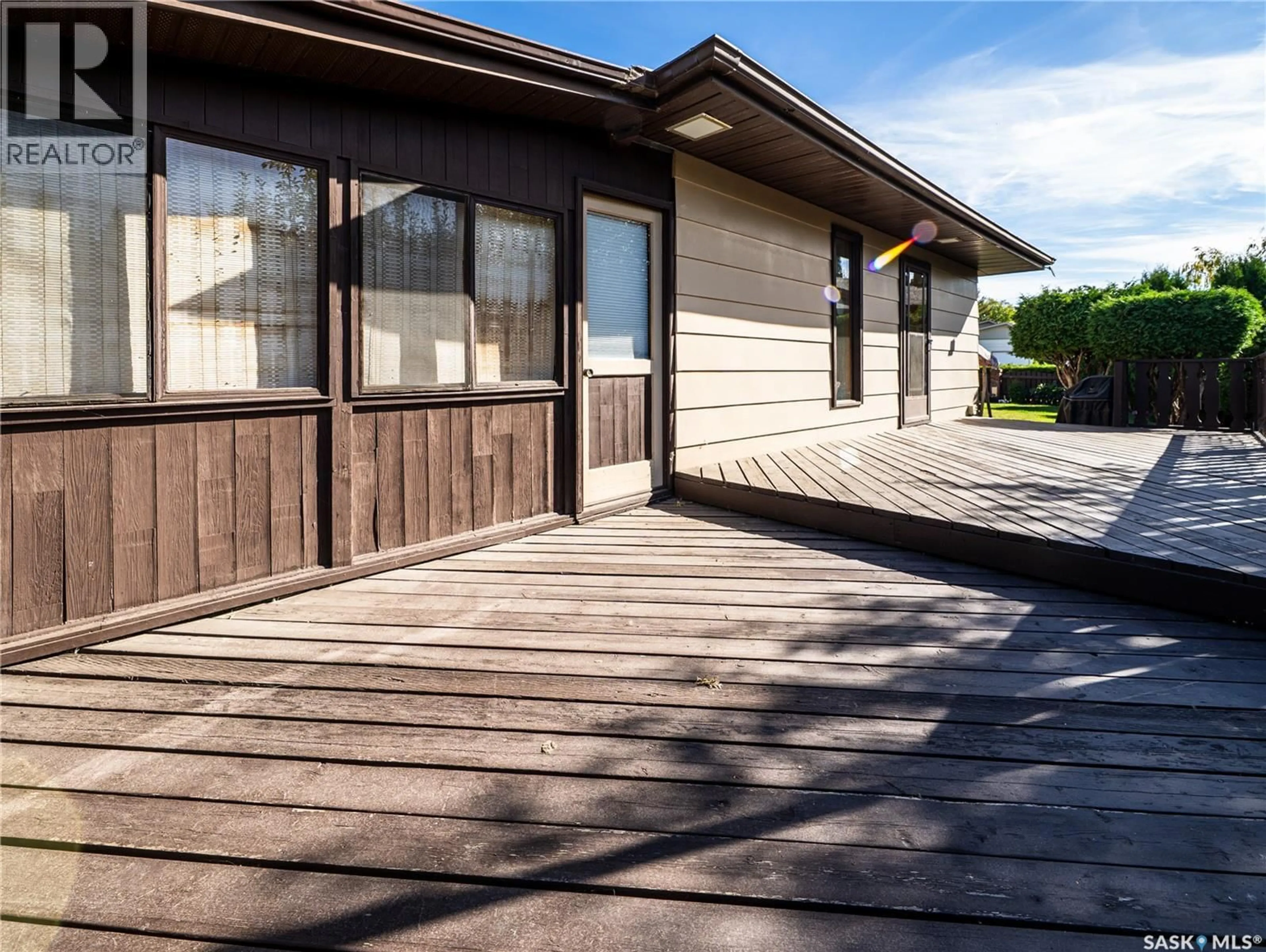 Home with vinyl exterior material, street for 11231 GARDINER DRIVE, North Battleford Saskatchewan S9A3M5