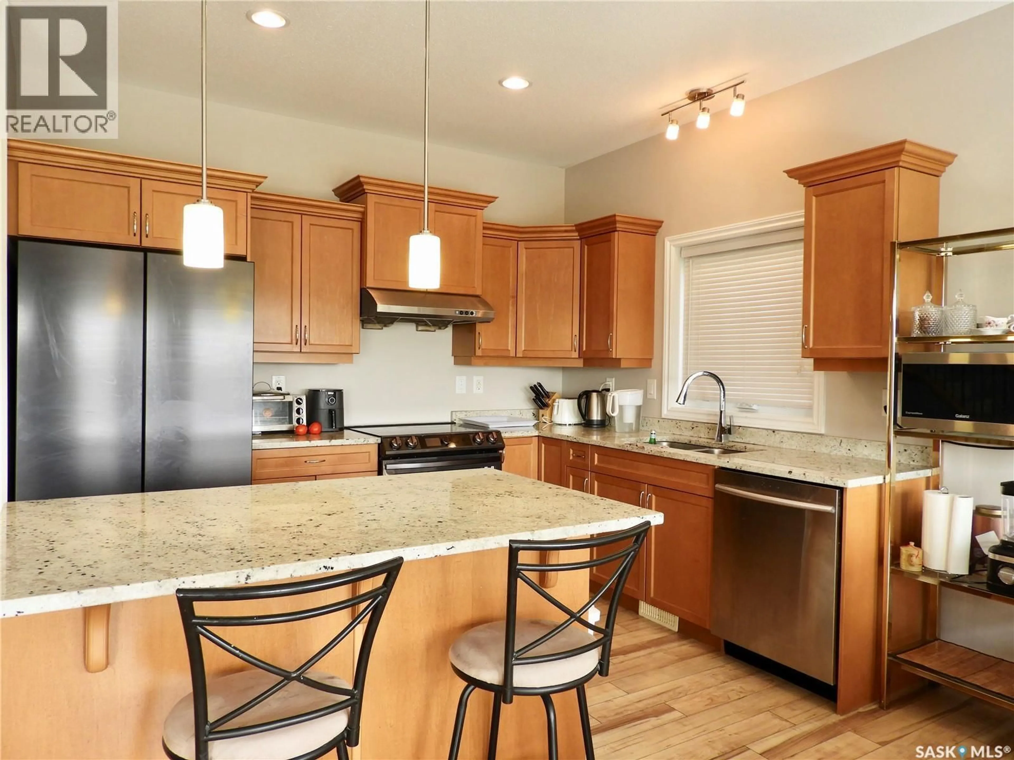 Open concept kitchen, unknown for 242 WHALLEY CRESCENT, Saskatoon Saskatchewan S7T0N9