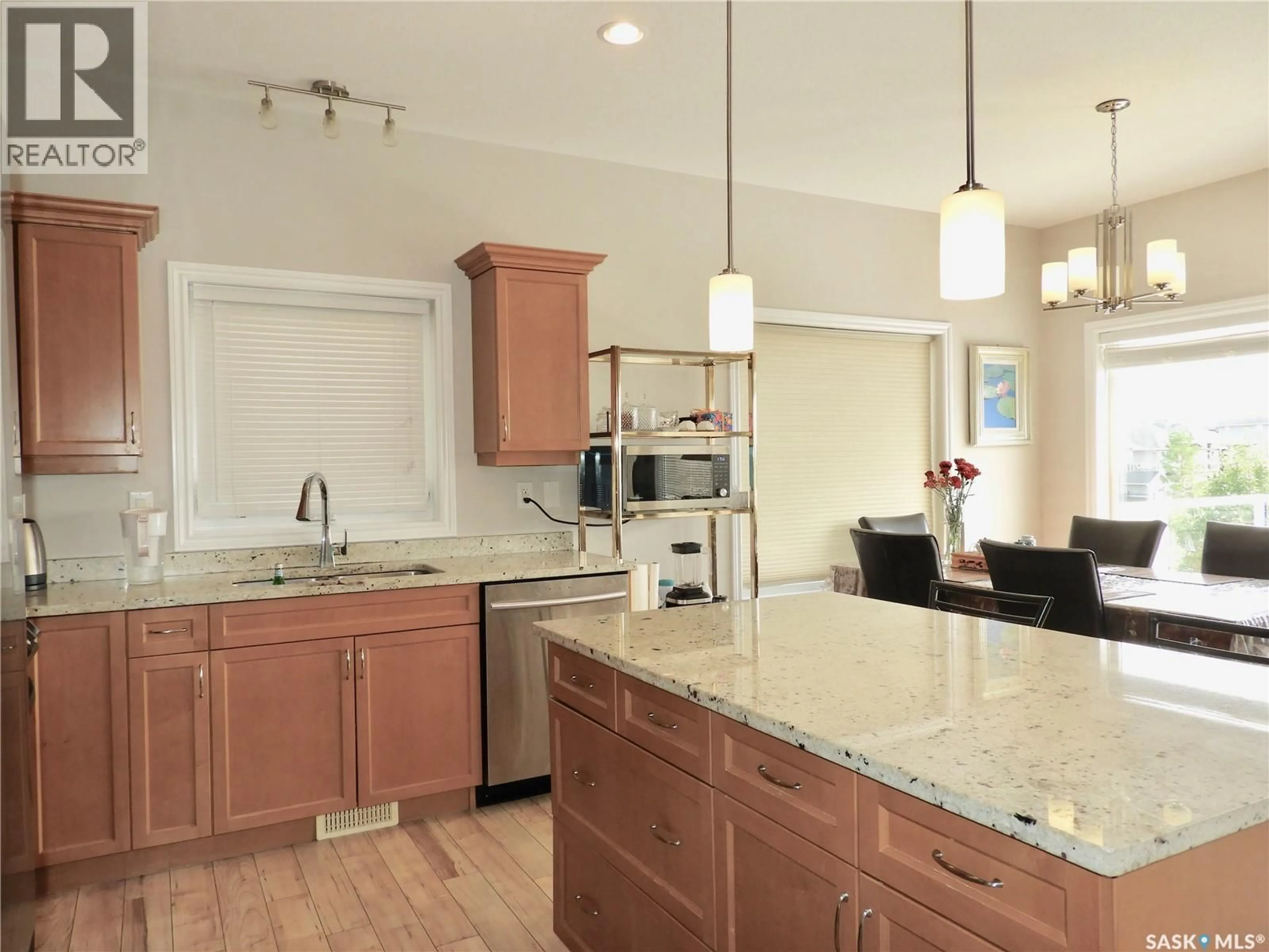 Open concept kitchen, unknown for 242 WHALLEY CRESCENT, Saskatoon Saskatchewan S7T0N9
