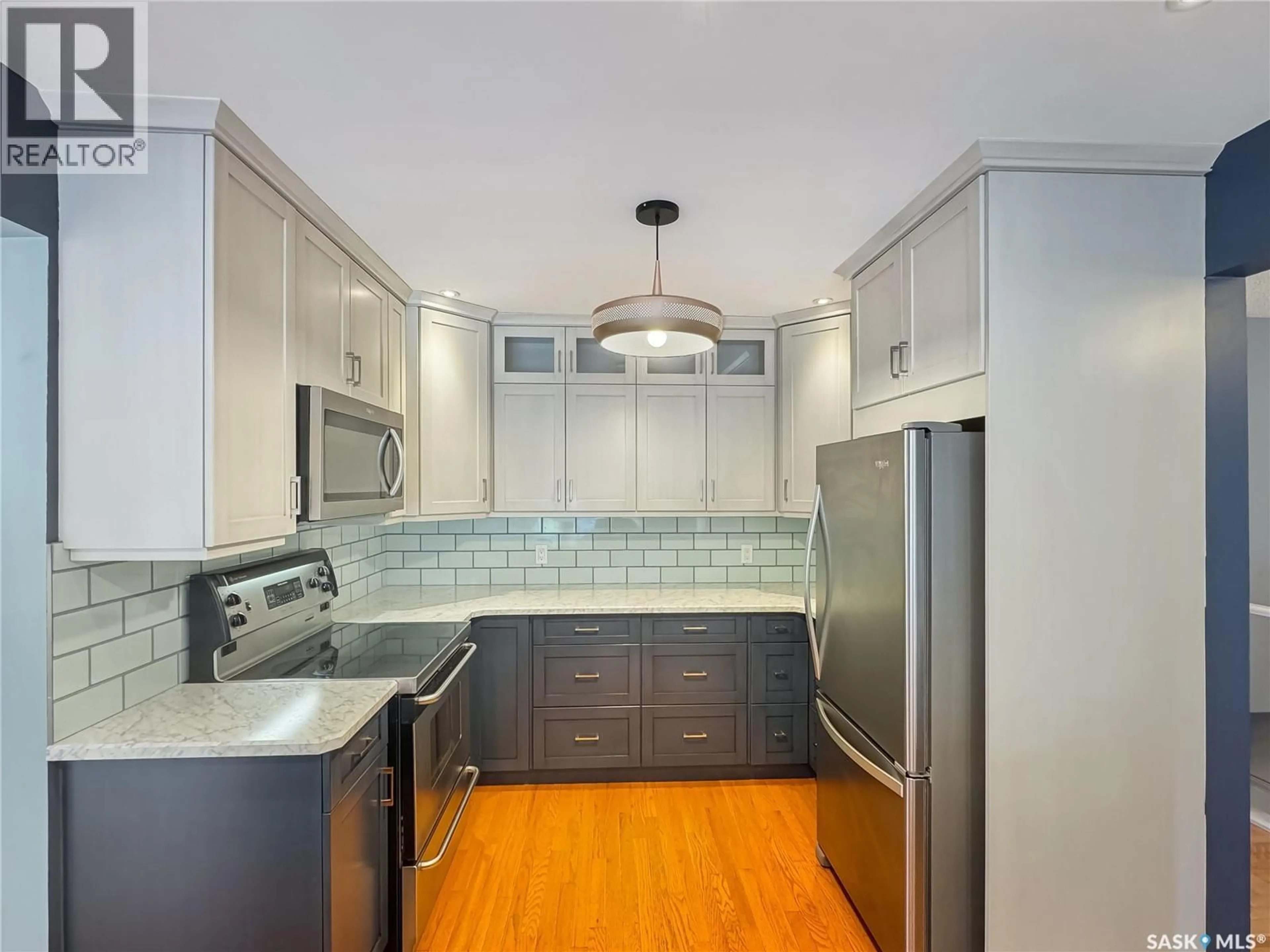 Contemporary kitchen, ceramic/tile floor for 8918 BOWERS DRIVE, North Battleford Saskatchewan S9A3C2