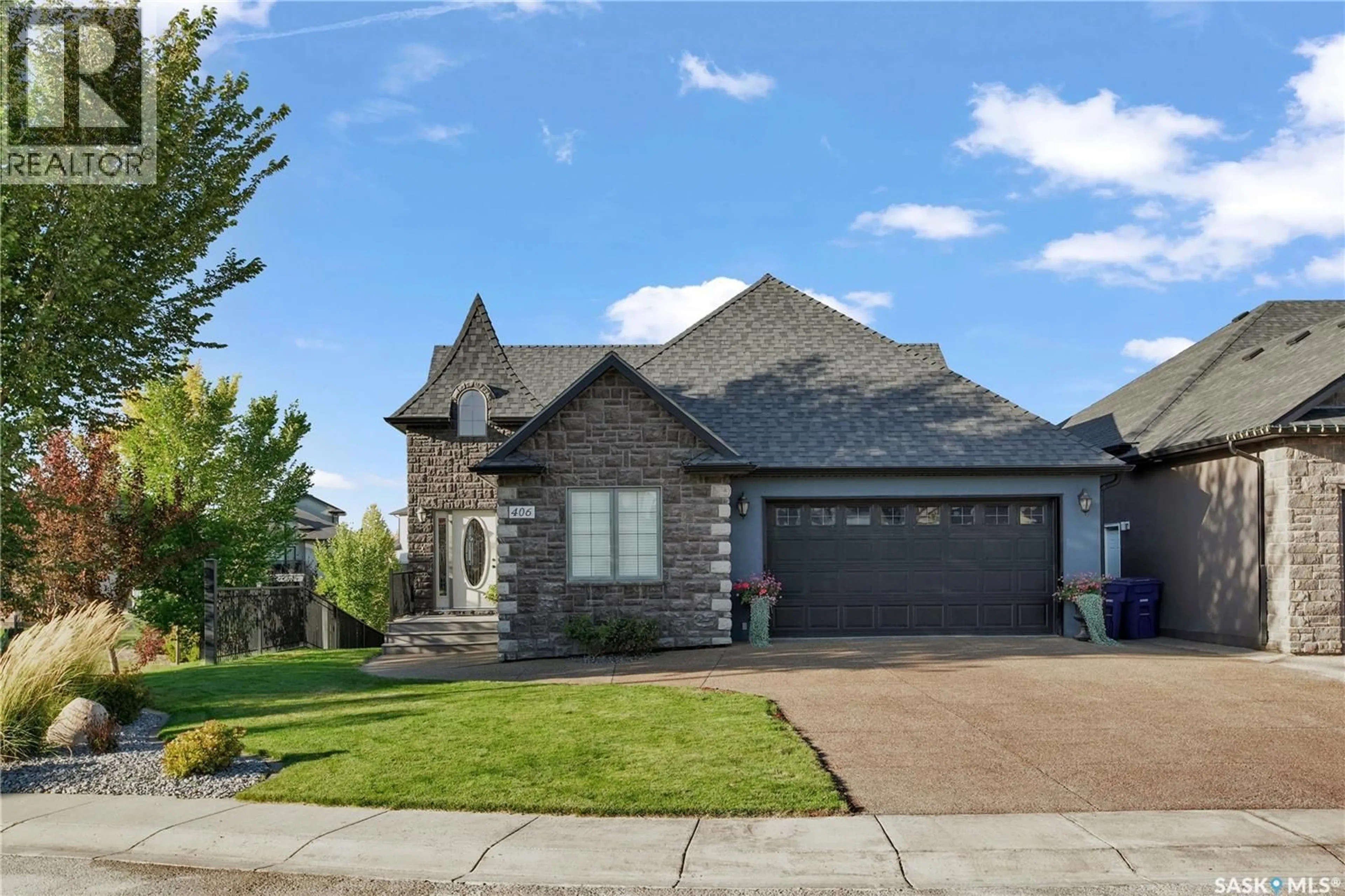 Home with brick exterior material, street for 406 TRIMBLE CRESCENT, Saskatoon Saskatchewan S7W0E1