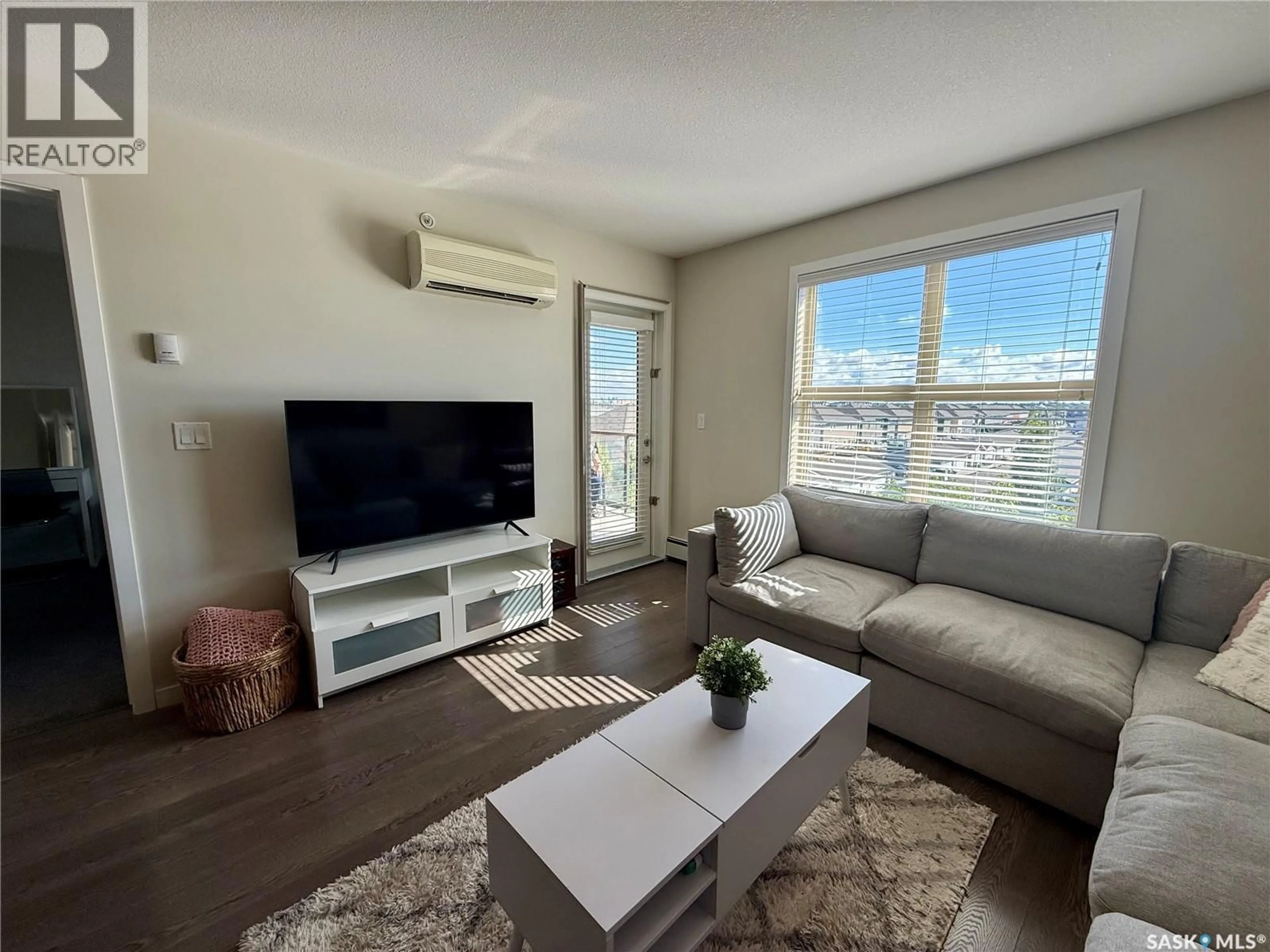 Living room with furniture, unknown for 5500 - 1425 MITCHINSON WAY, Regina Saskatchewan S4W0N9