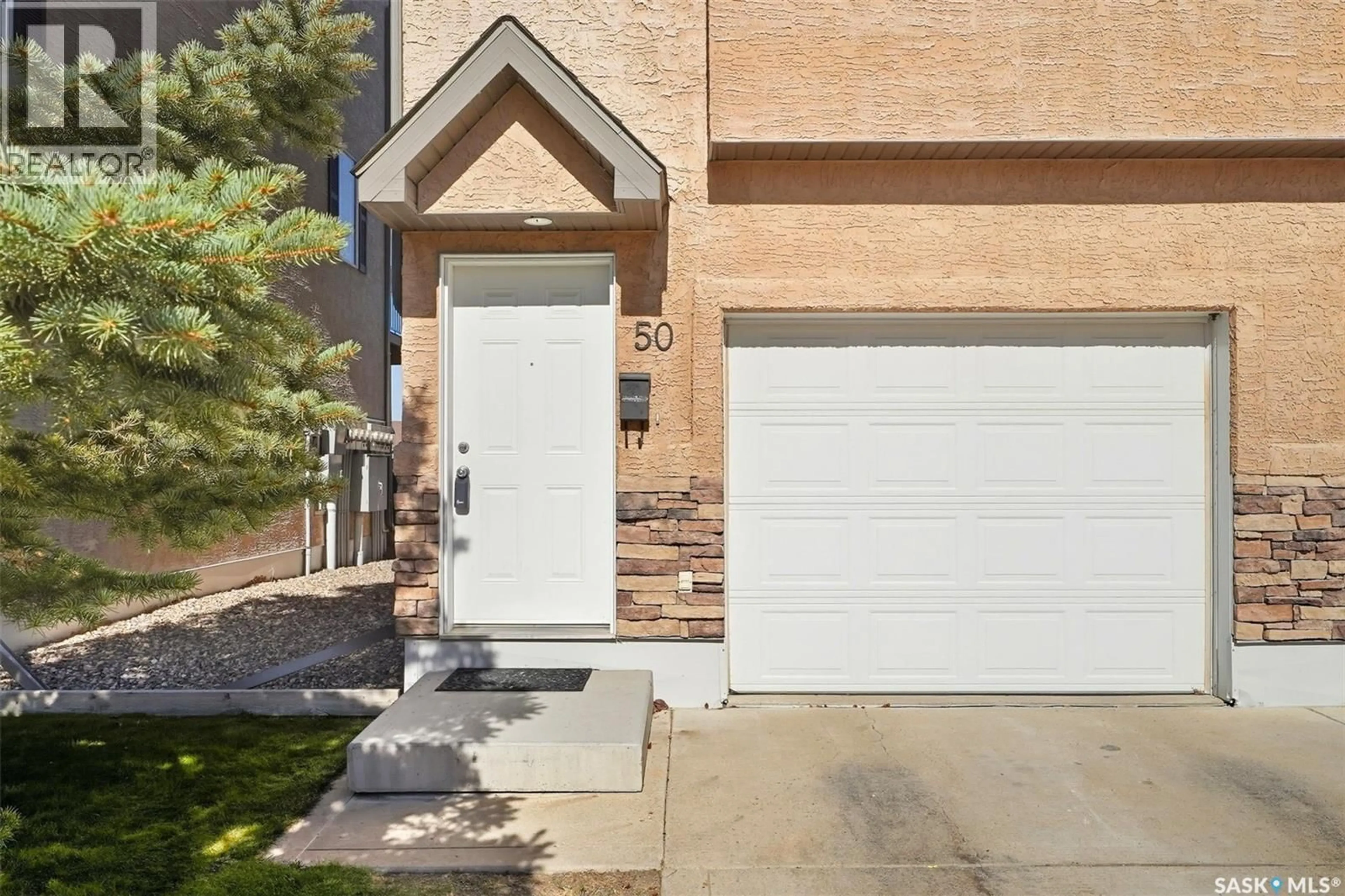 Home with brick exterior material, street for 50 118 PAWLYCHENKO LANE, Saskatoon Saskatchewan S7V1J9