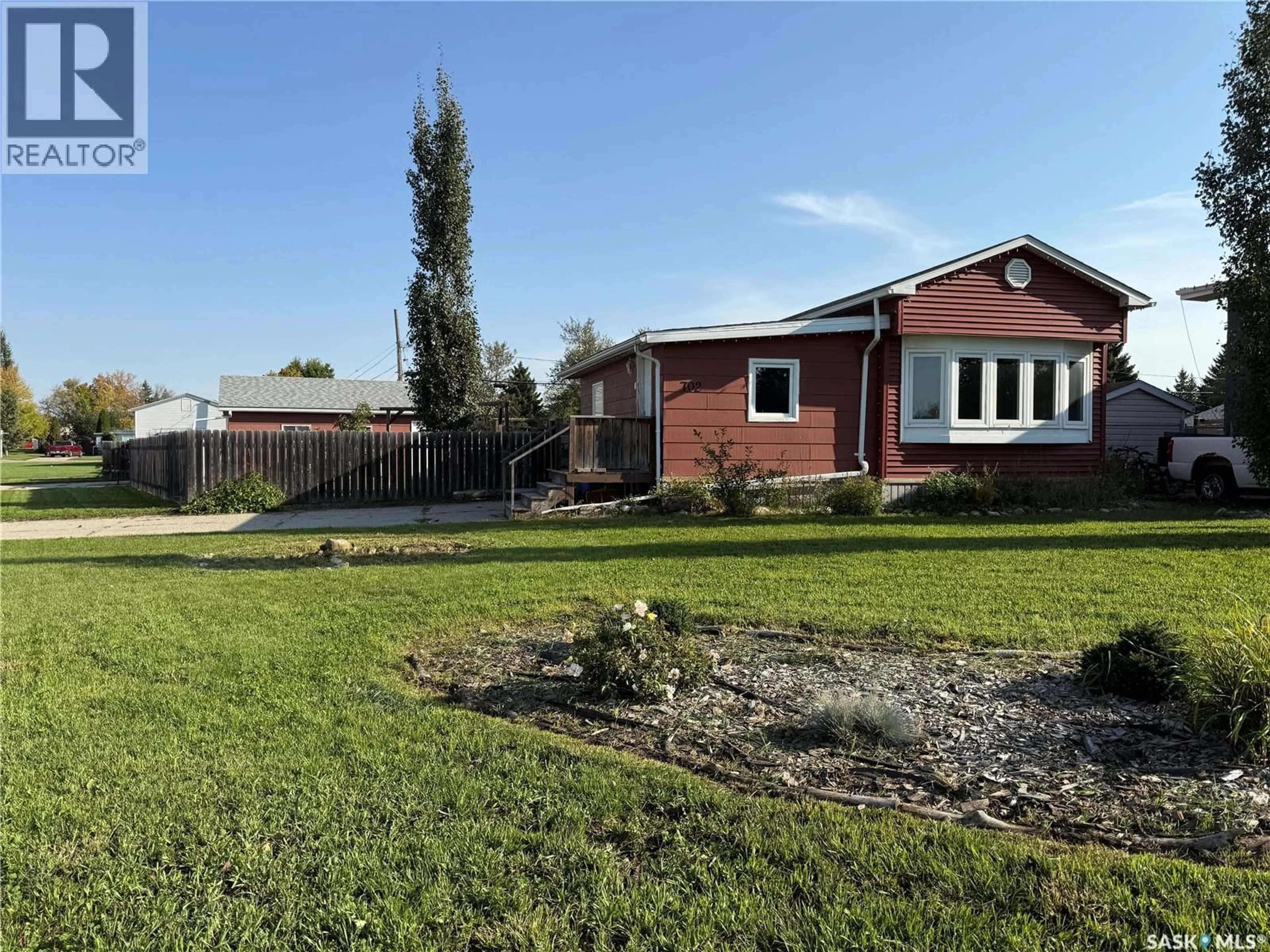A pic from outside/outdoor area/front of a property/back of a property/a pic from drone, street for 702 4TH AVENUE, Melville Saskatchewan S0A2P0