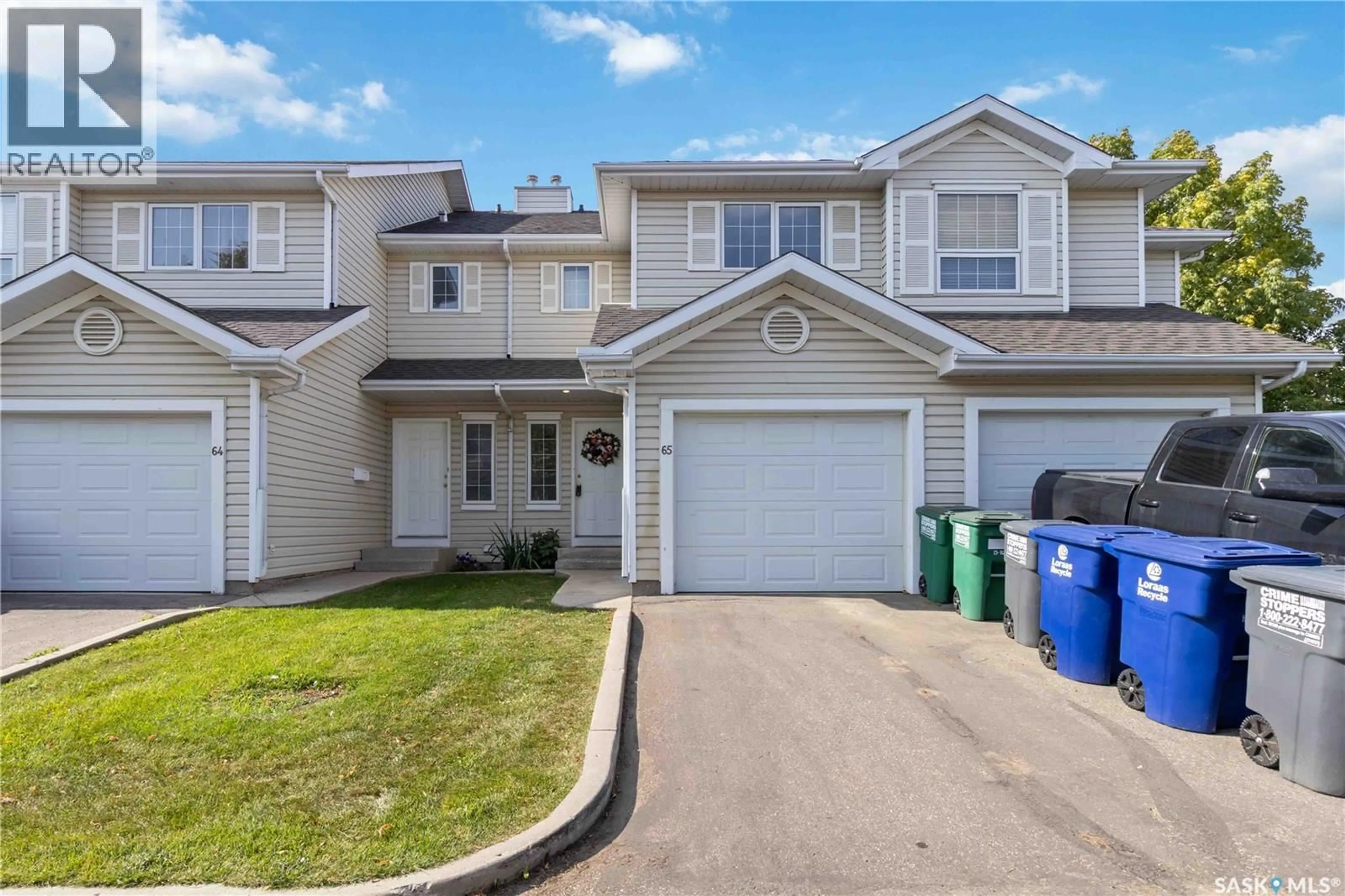 Home with vinyl exterior material, street for 65 110 KEEVIL CRESCENT, Saskatoon Saskatchewan S7N4N8