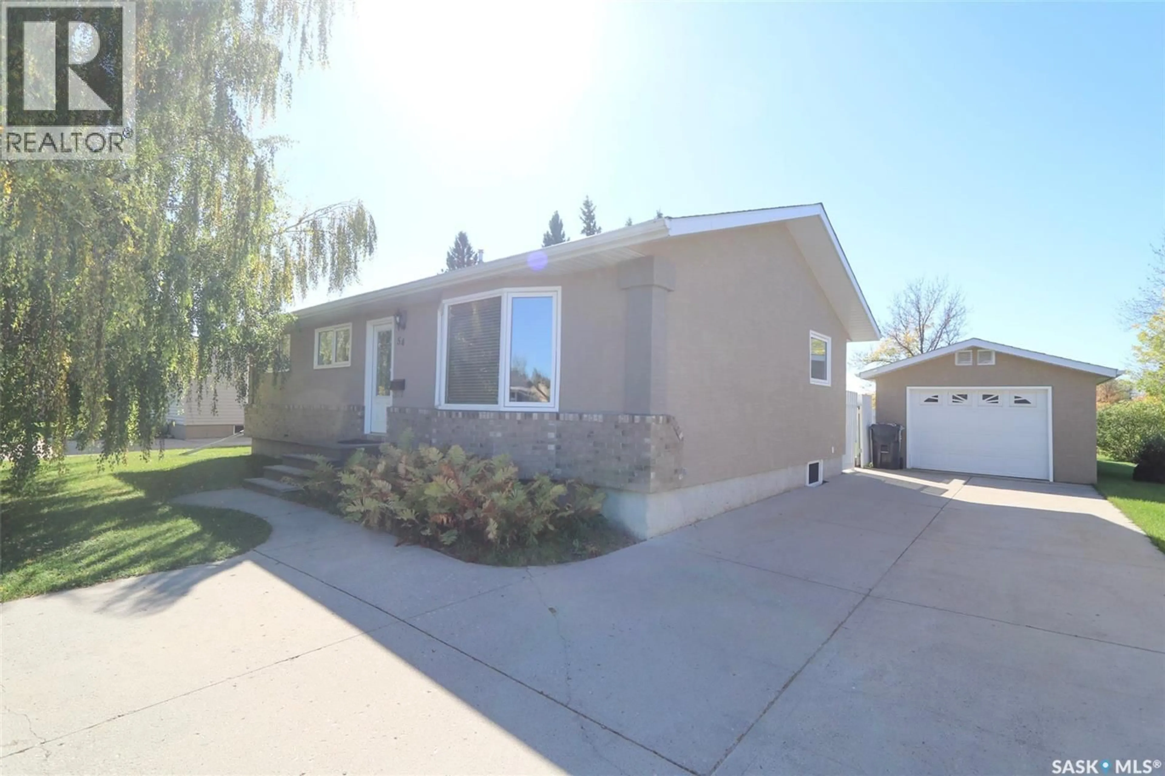 Home with vinyl exterior material, street for 54 MACKENZIE DRIVE, Yorkton Saskatchewan S3N3H5