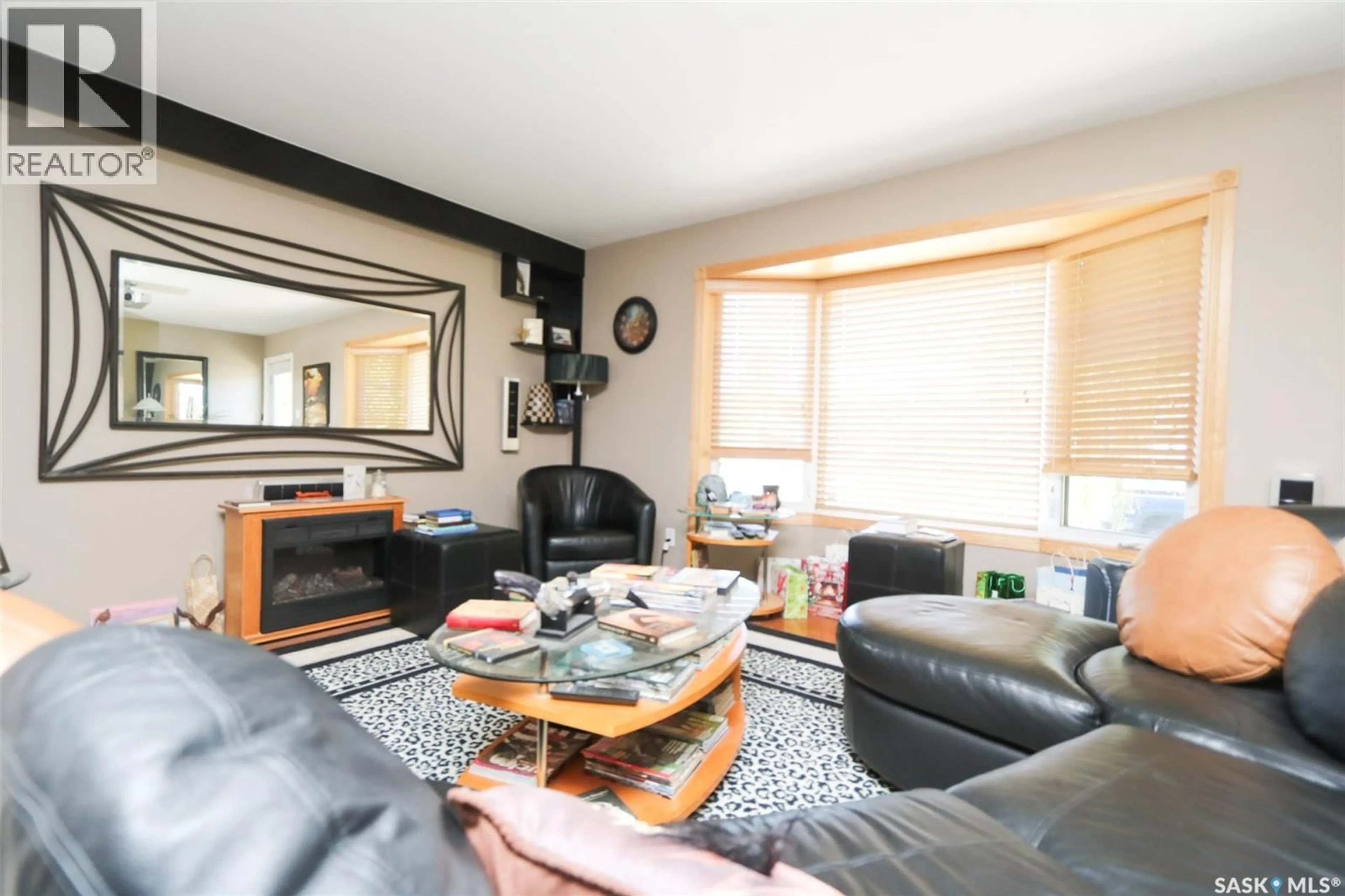 Living room with furniture, wood/laminate floor for 54 MACKENZIE DRIVE, Yorkton Saskatchewan S3N3H5