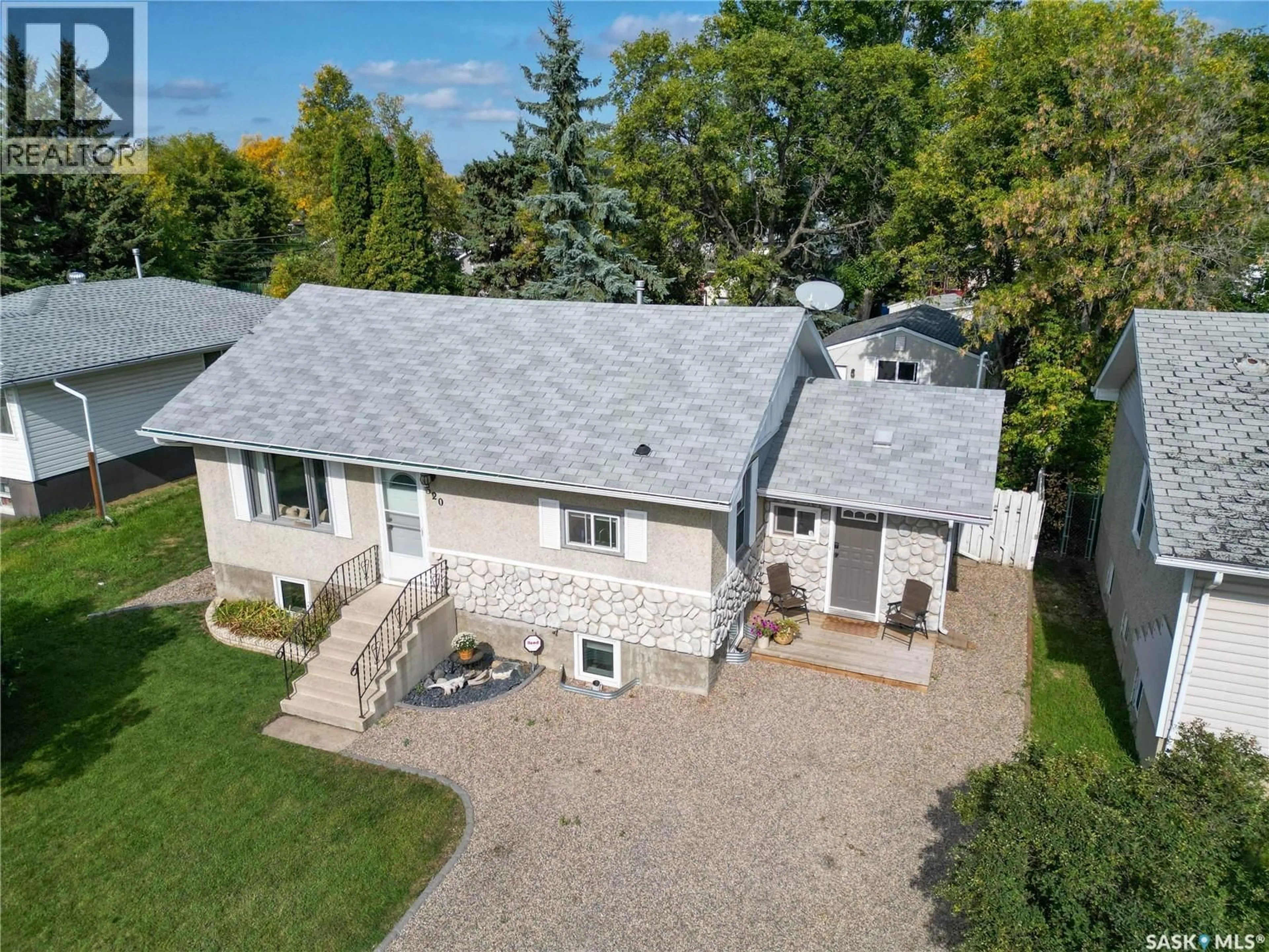 A pic from outside/outdoor area/front of a property/back of a property/a pic from drone, street for 520 26TH STREET, Prince Albert Saskatchewan S6V1V5