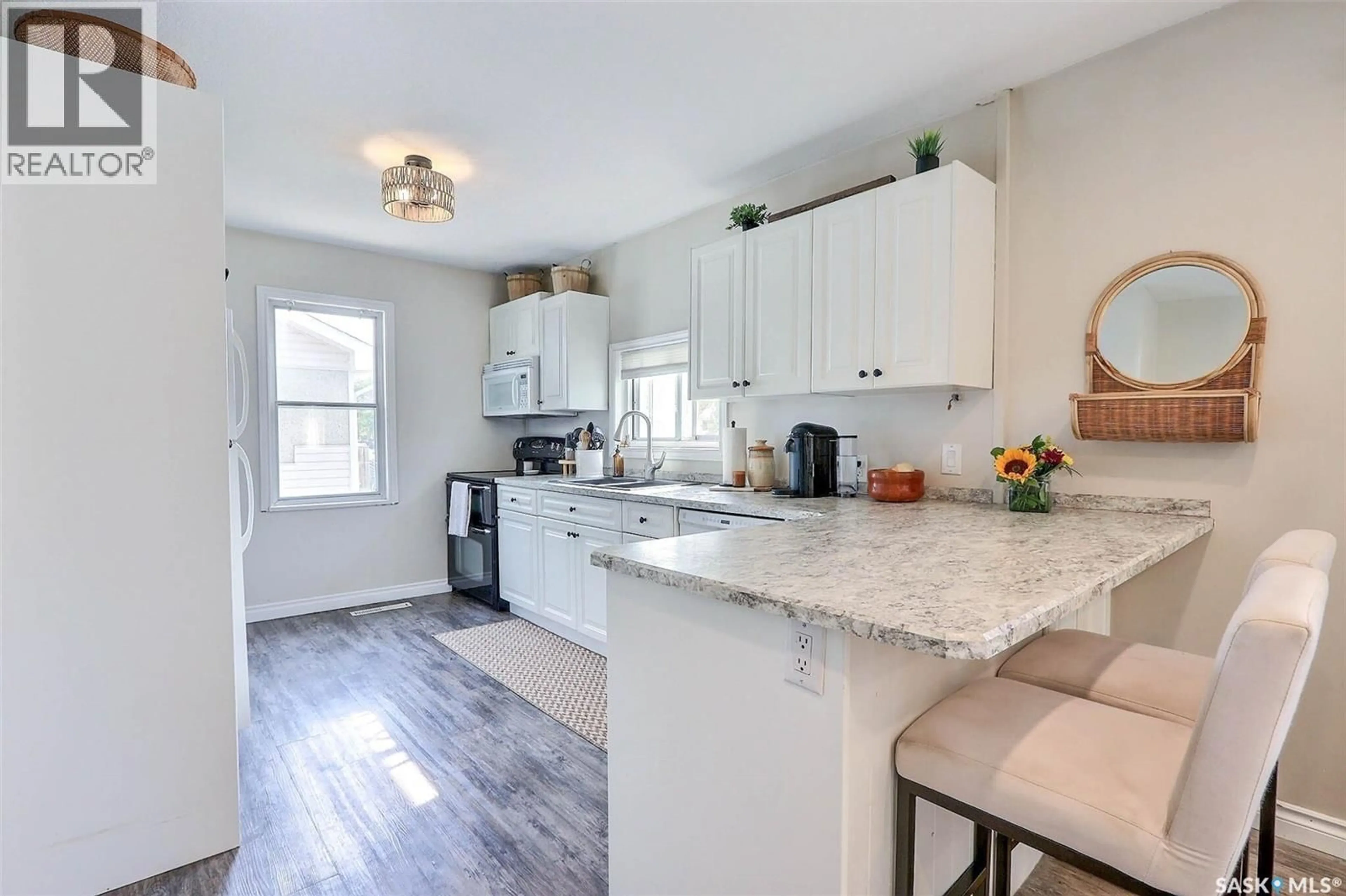 Open concept kitchen, ceramic/tile floor for 520 26TH STREET, Prince Albert Saskatchewan S6V1V5