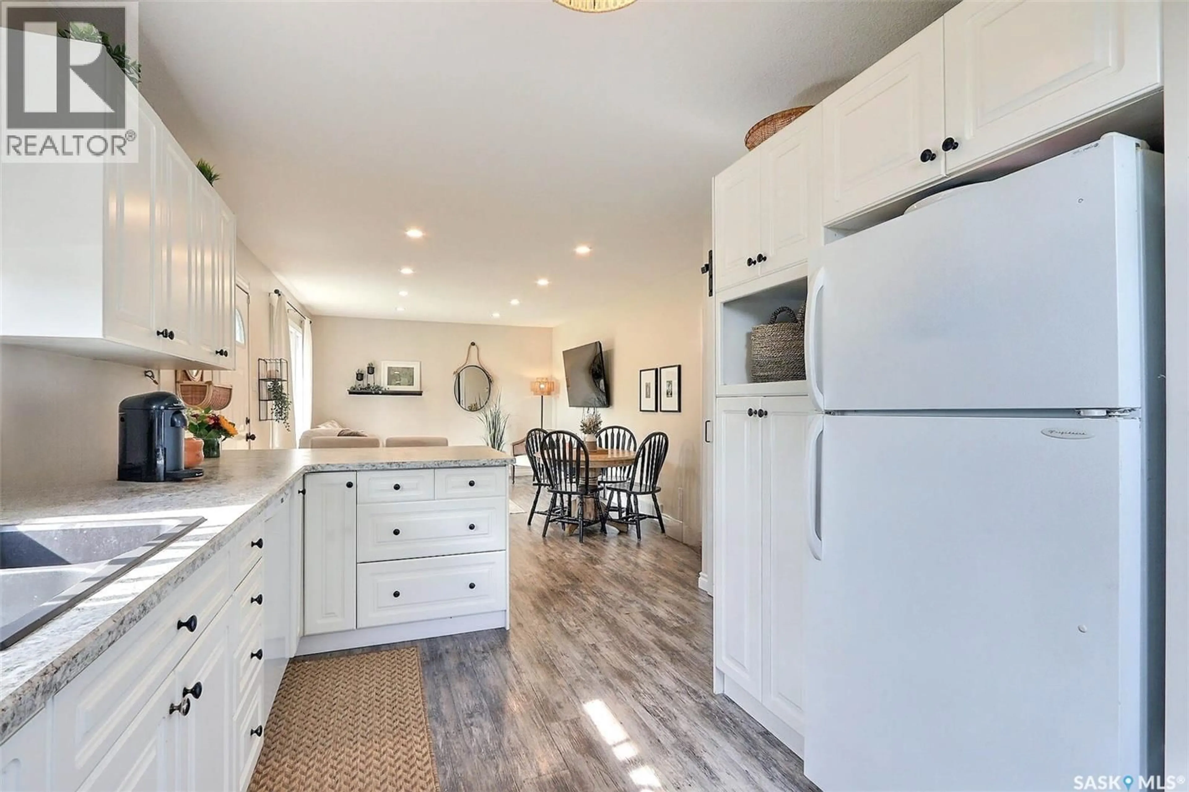 Open concept kitchen, ceramic/tile floor for 520 26TH STREET, Prince Albert Saskatchewan S6V1V5