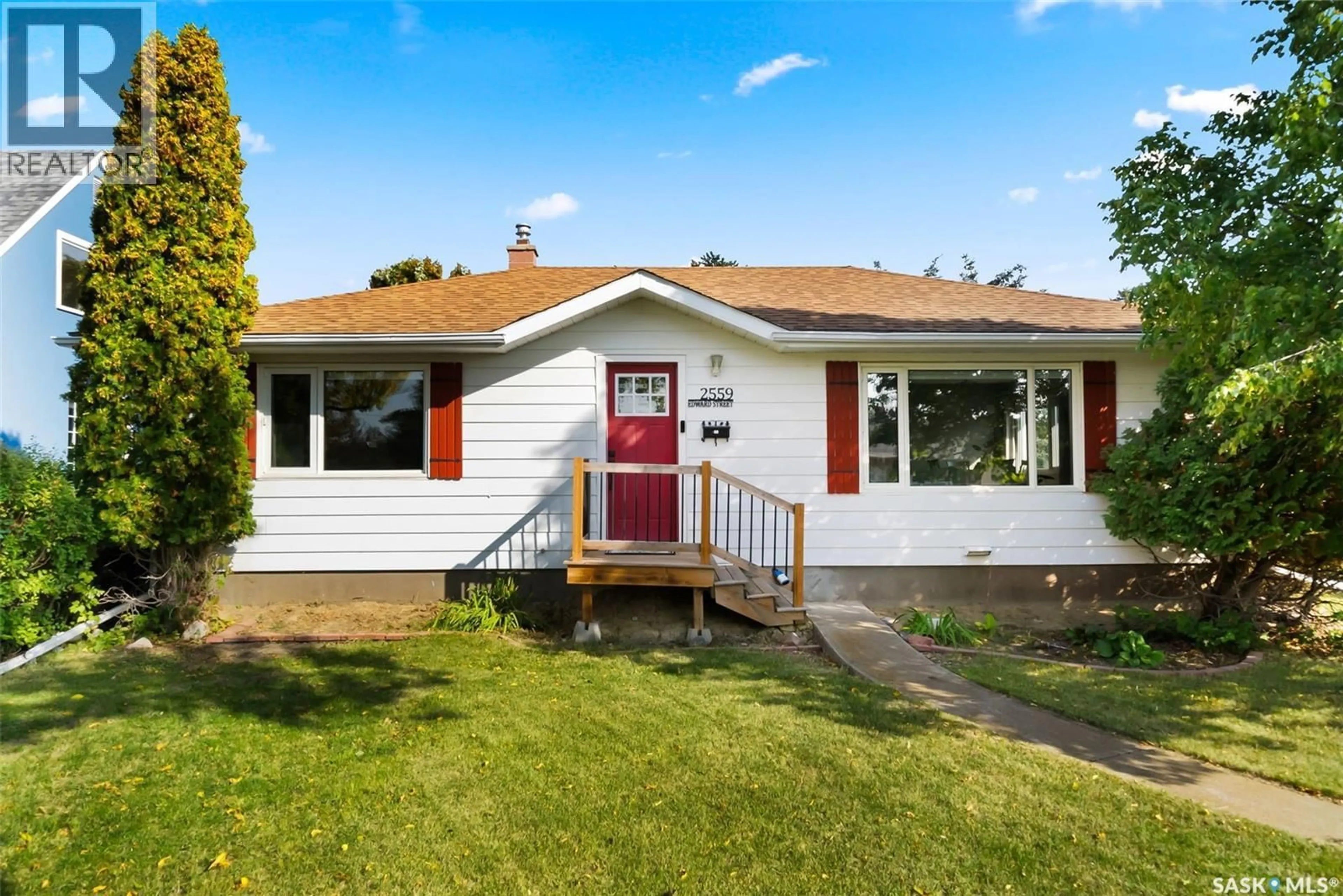 Home with vinyl exterior material, street for 2559 EDWARD STREET, Regina Saskatchewan S4S0M9