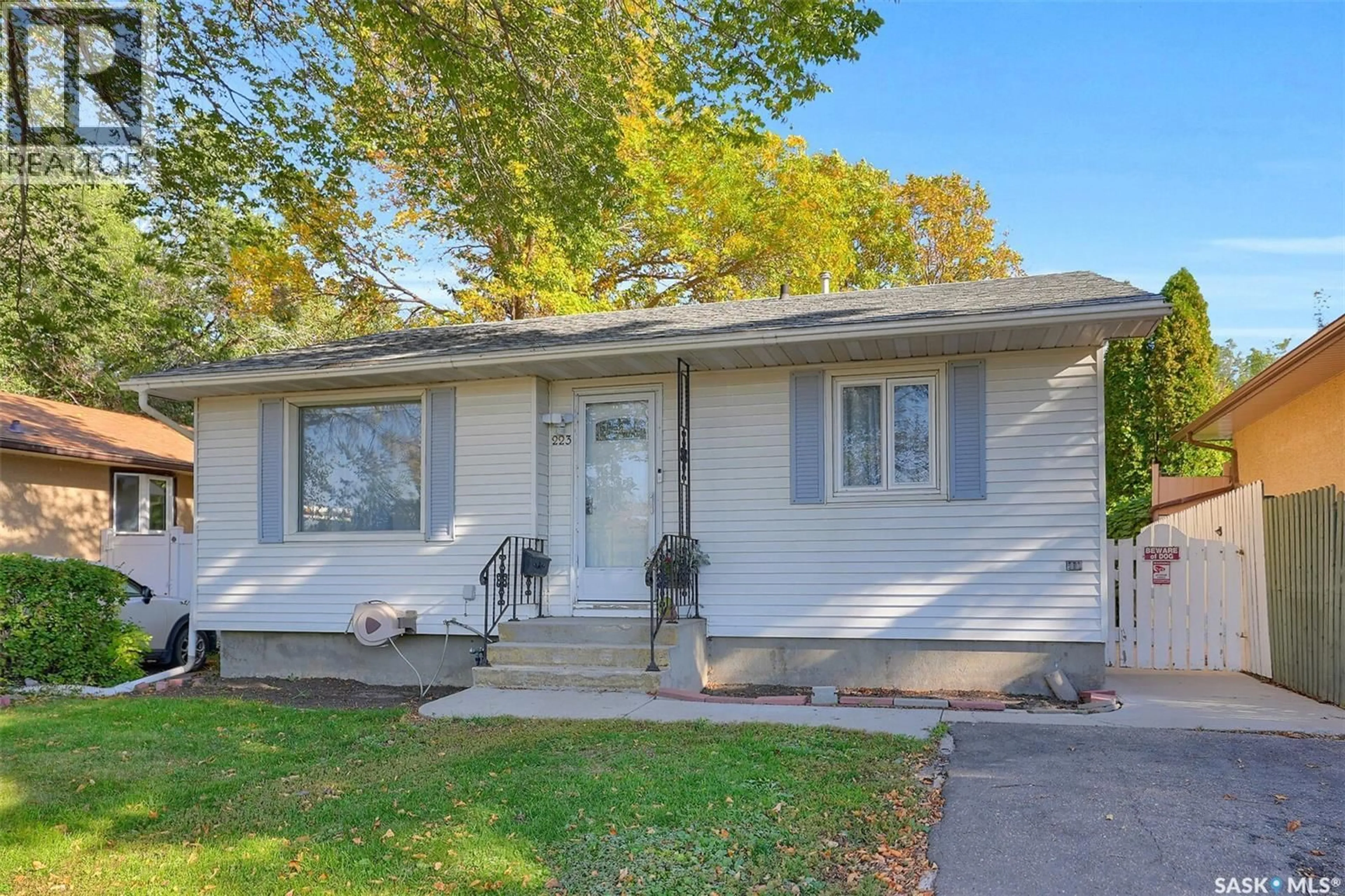 Home with vinyl exterior material, street for 223 MCCARTHY BOULEVARD, Regina Saskatchewan S4R5N1