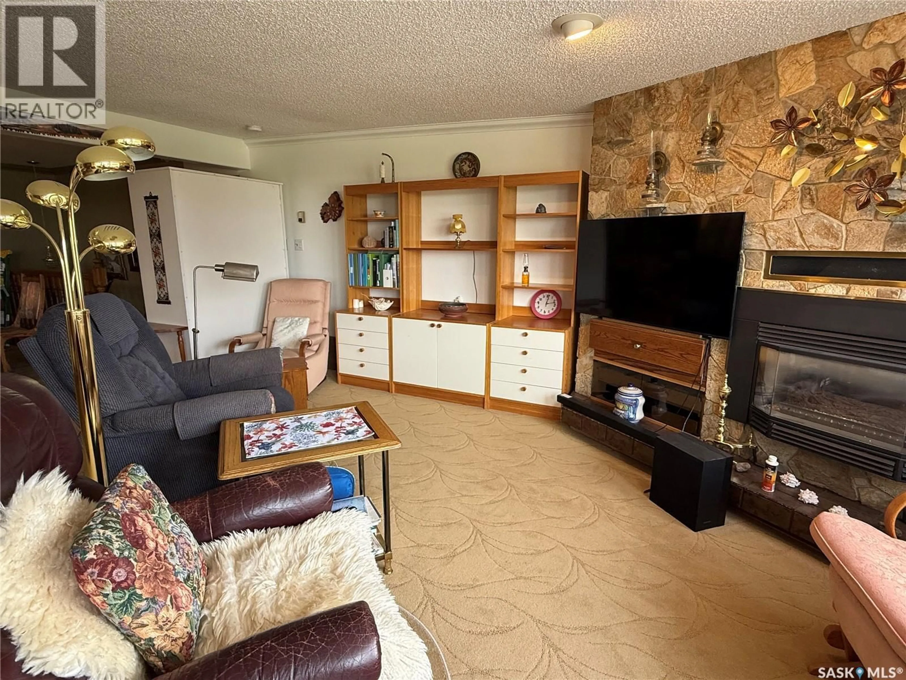 Living room with furniture, unknown for 8 275 ALPINE CRESCENT, Swift Current Saskatchewan S9H4T5