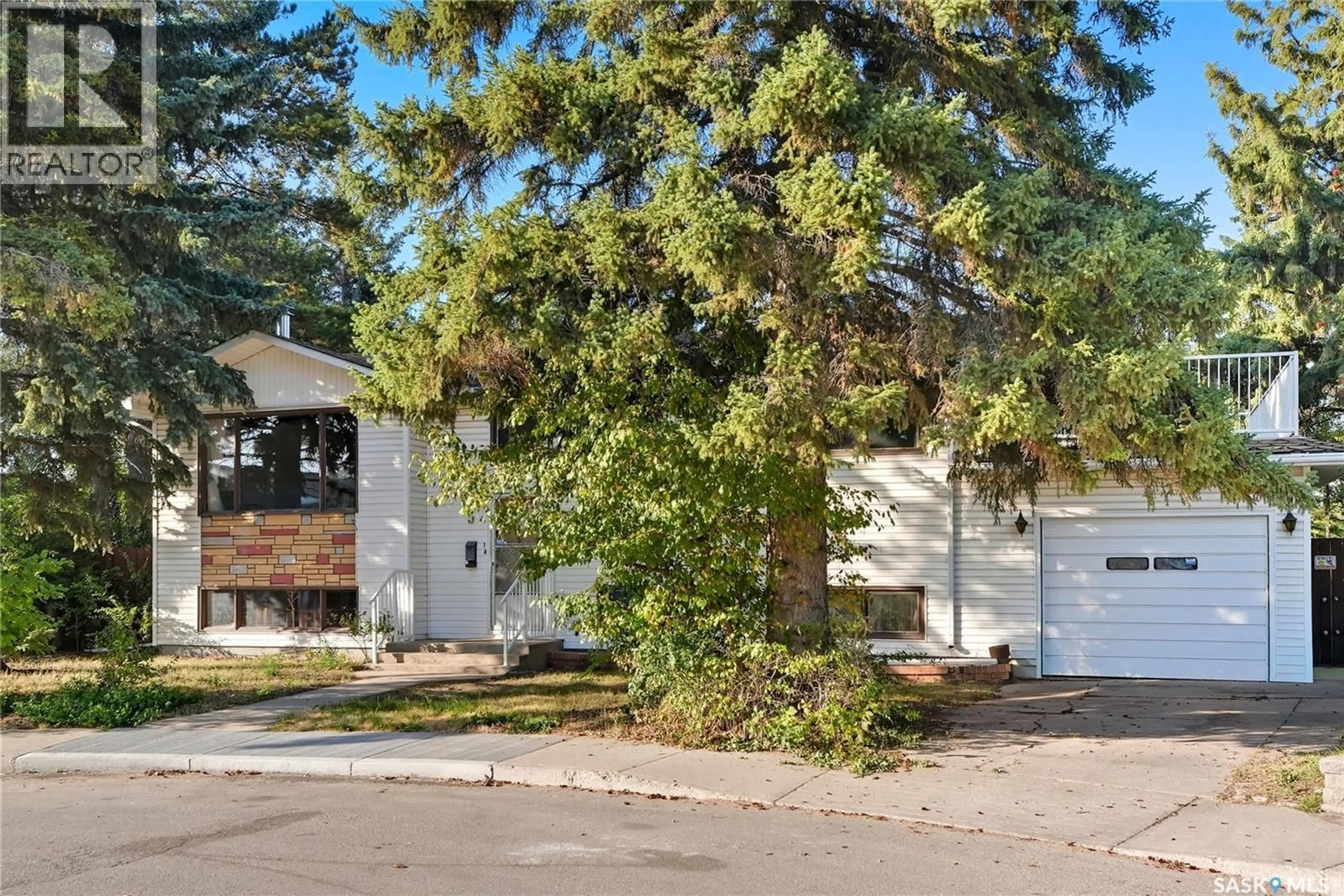 Home with brick exterior material, street for 5 HAMILTON PLACE, Saskatoon Saskatchewan S7L3N3