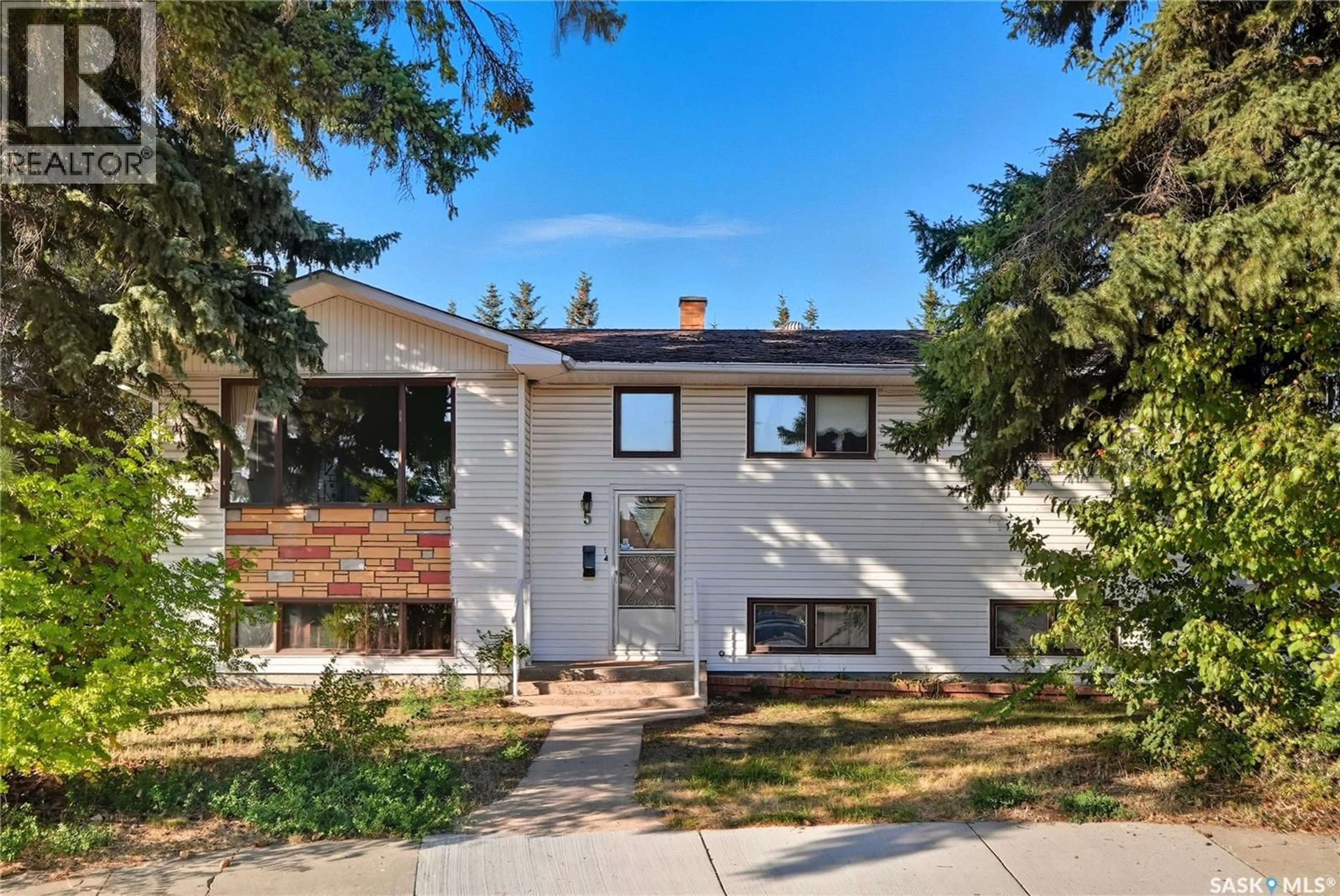 Home with brick exterior material, street for 5 HAMILTON PLACE, Saskatoon Saskatchewan S7L3N3