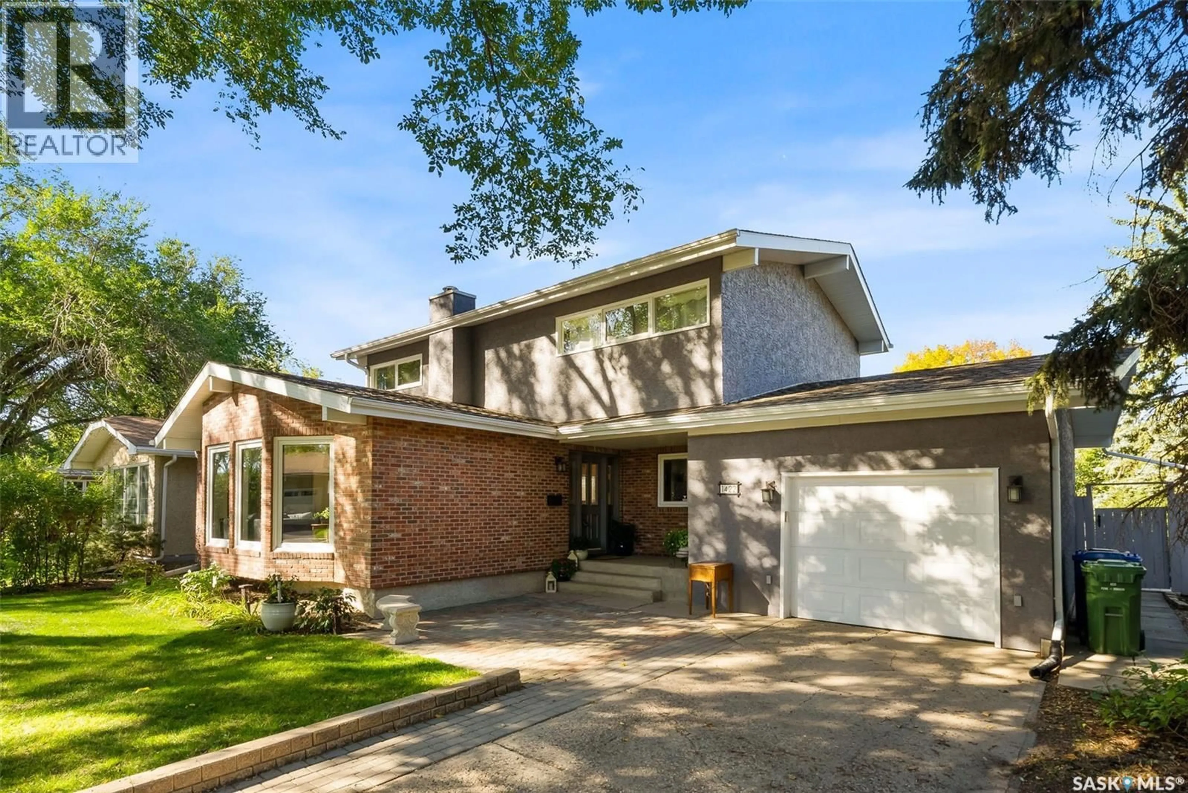 Home with brick exterior material, street for 1422 UHRICH AVENUE, Regina Saskatchewan S4S3R7