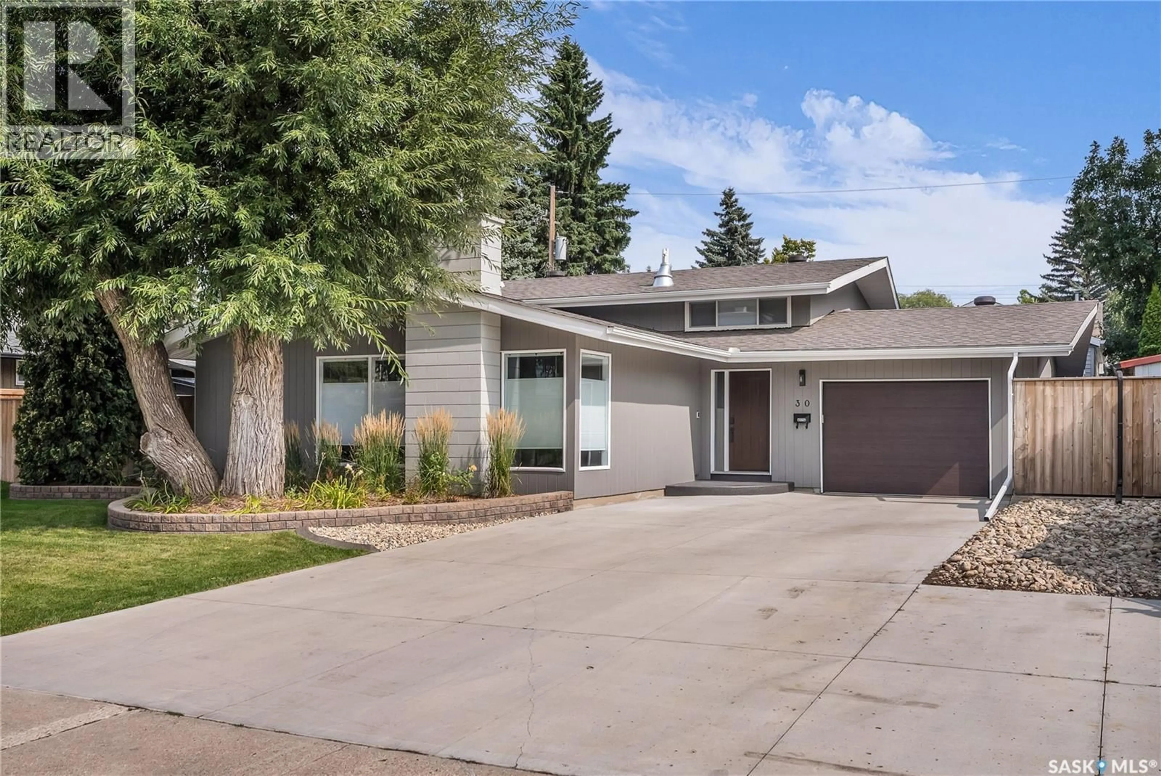 Home with vinyl exterior material, street for 30 SIMPSON CRESCENT, Saskatoon Saskatchewan S7H3C6