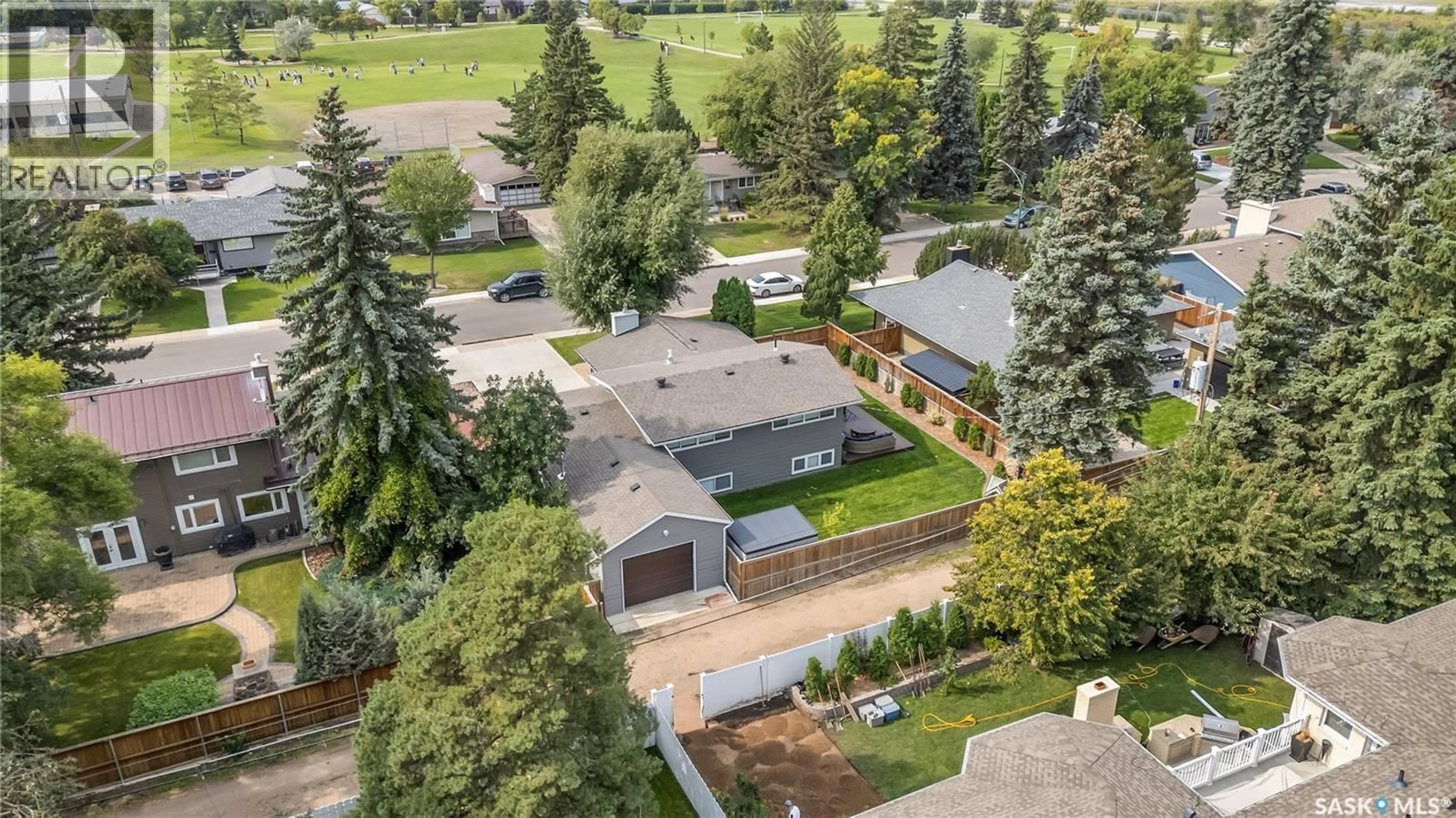 A pic from outside/outdoor area/front of a property/back of a property/a pic from drone, street for 30 SIMPSON CRESCENT, Saskatoon Saskatchewan S7H3C6