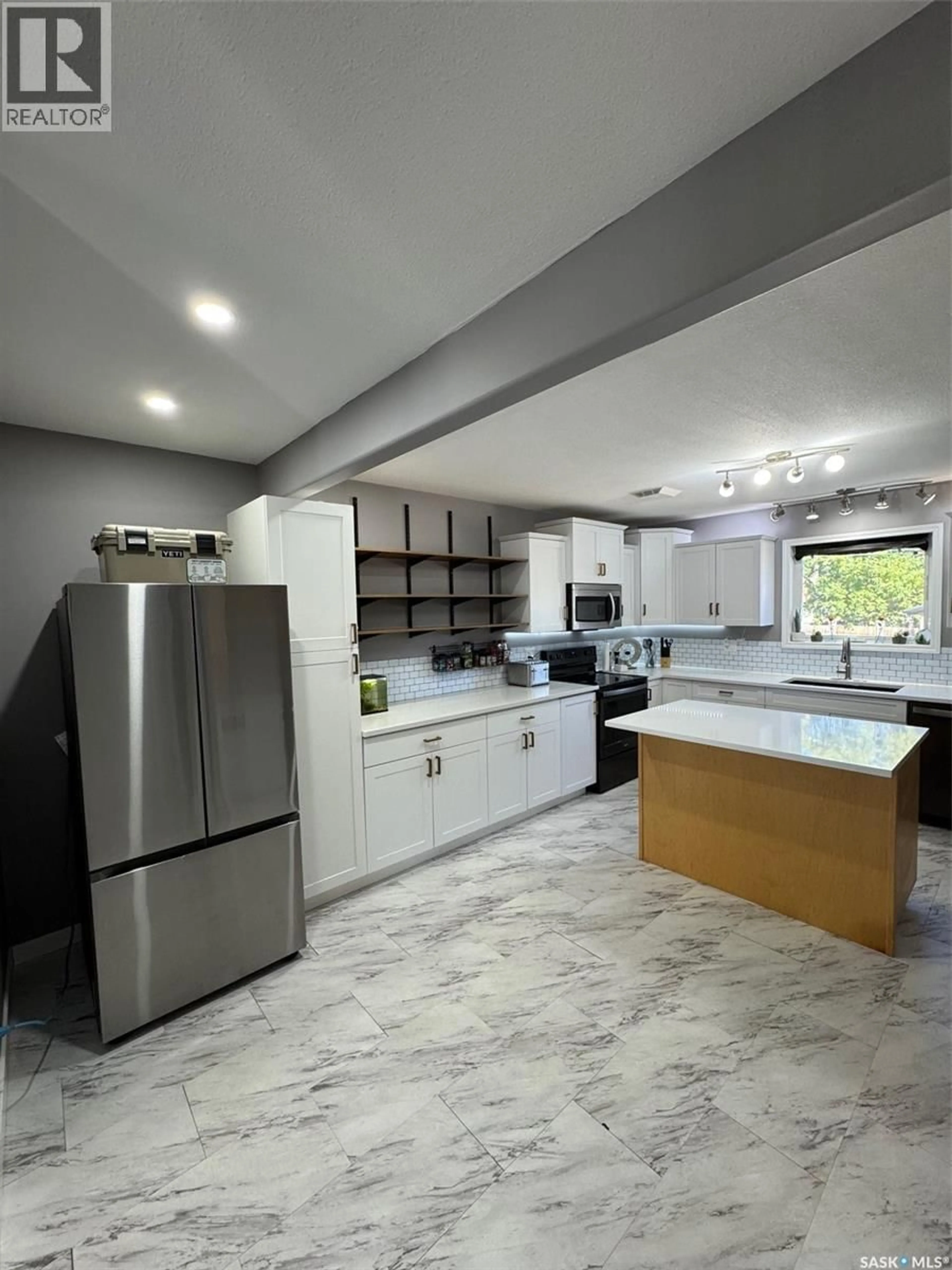 Open concept kitchen, ceramic/tile floor for 200 111TH STREET, Saskatoon Saskatchewan S7N1T2
