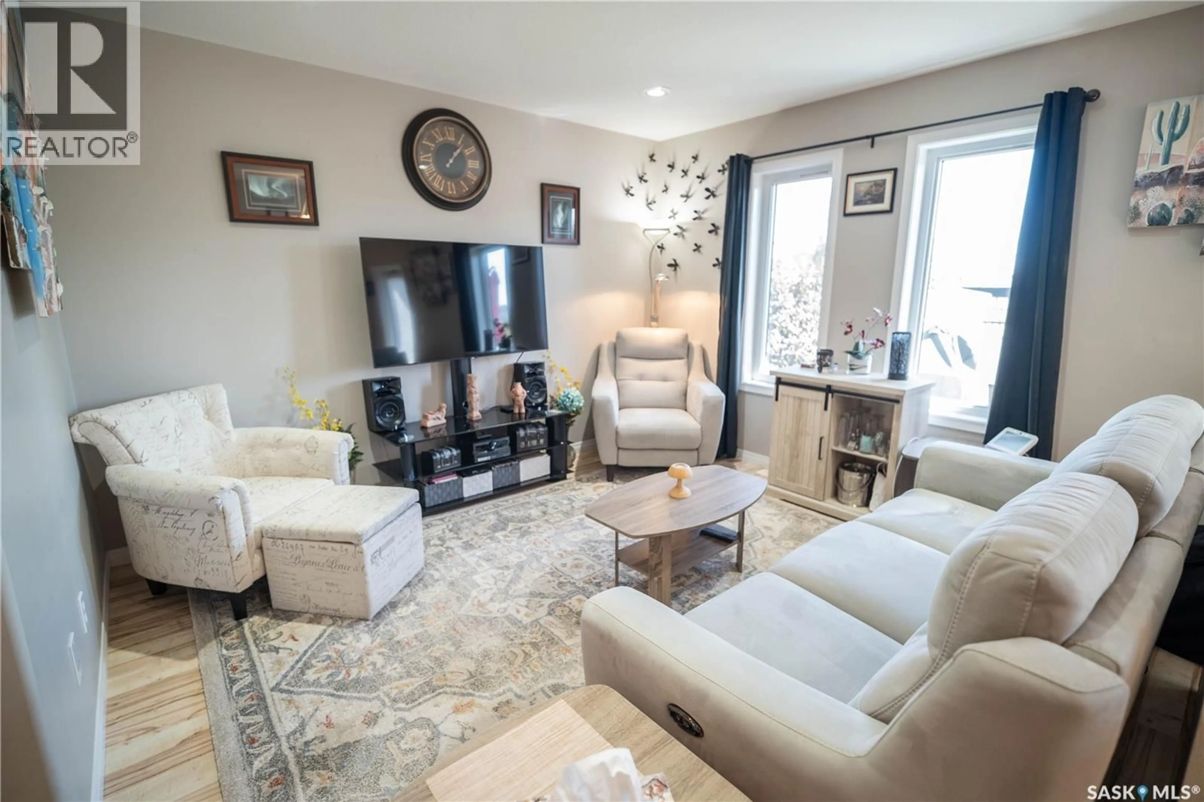 Living room with furniture, unknown for 20 547 EAST HAMPTON BOULEVARD, Saskatoon Saskatchewan S7R0H8