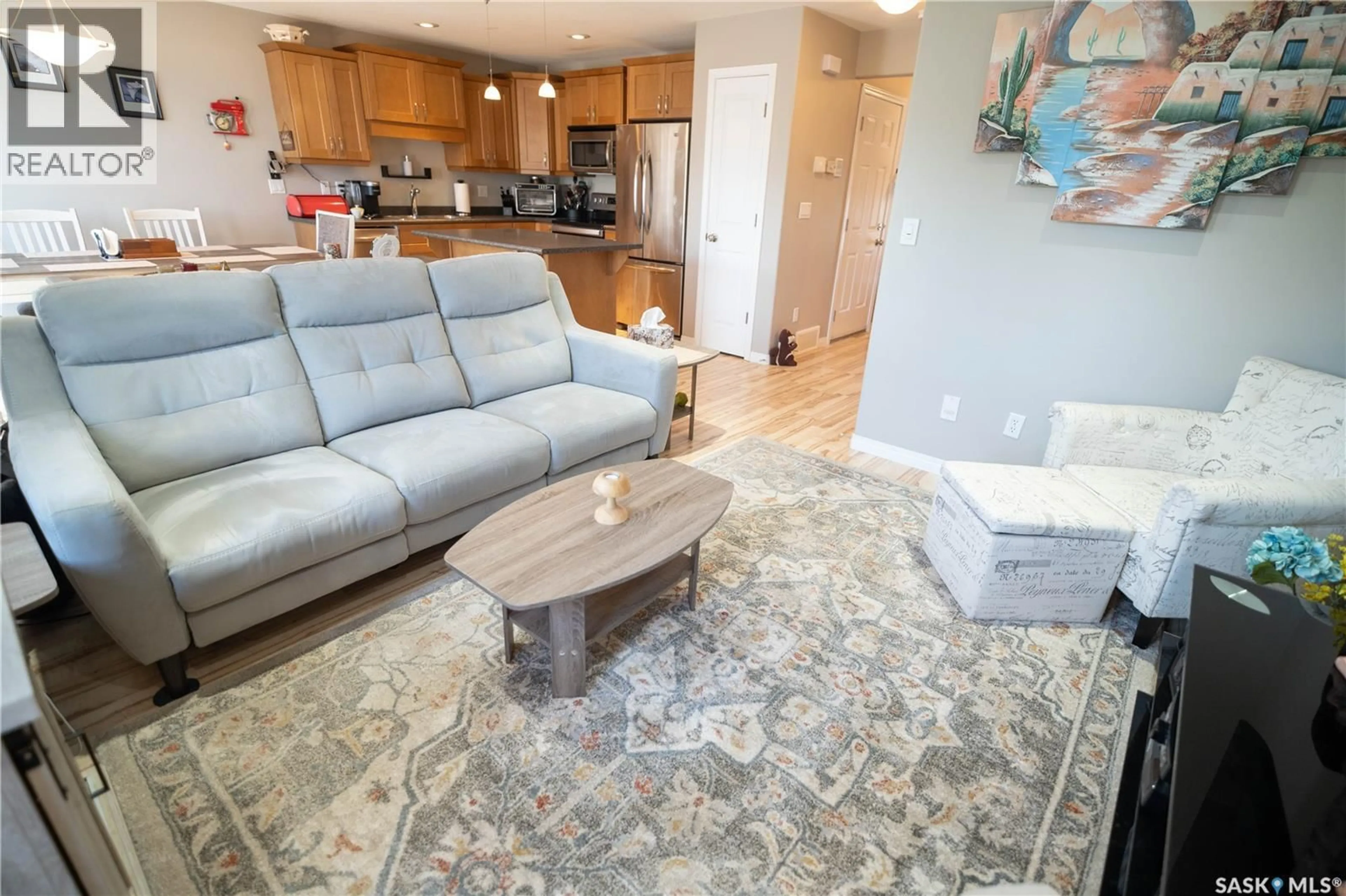 Living room with furniture, unknown for 20 547 EAST HAMPTON BOULEVARD, Saskatoon Saskatchewan S7R0H8