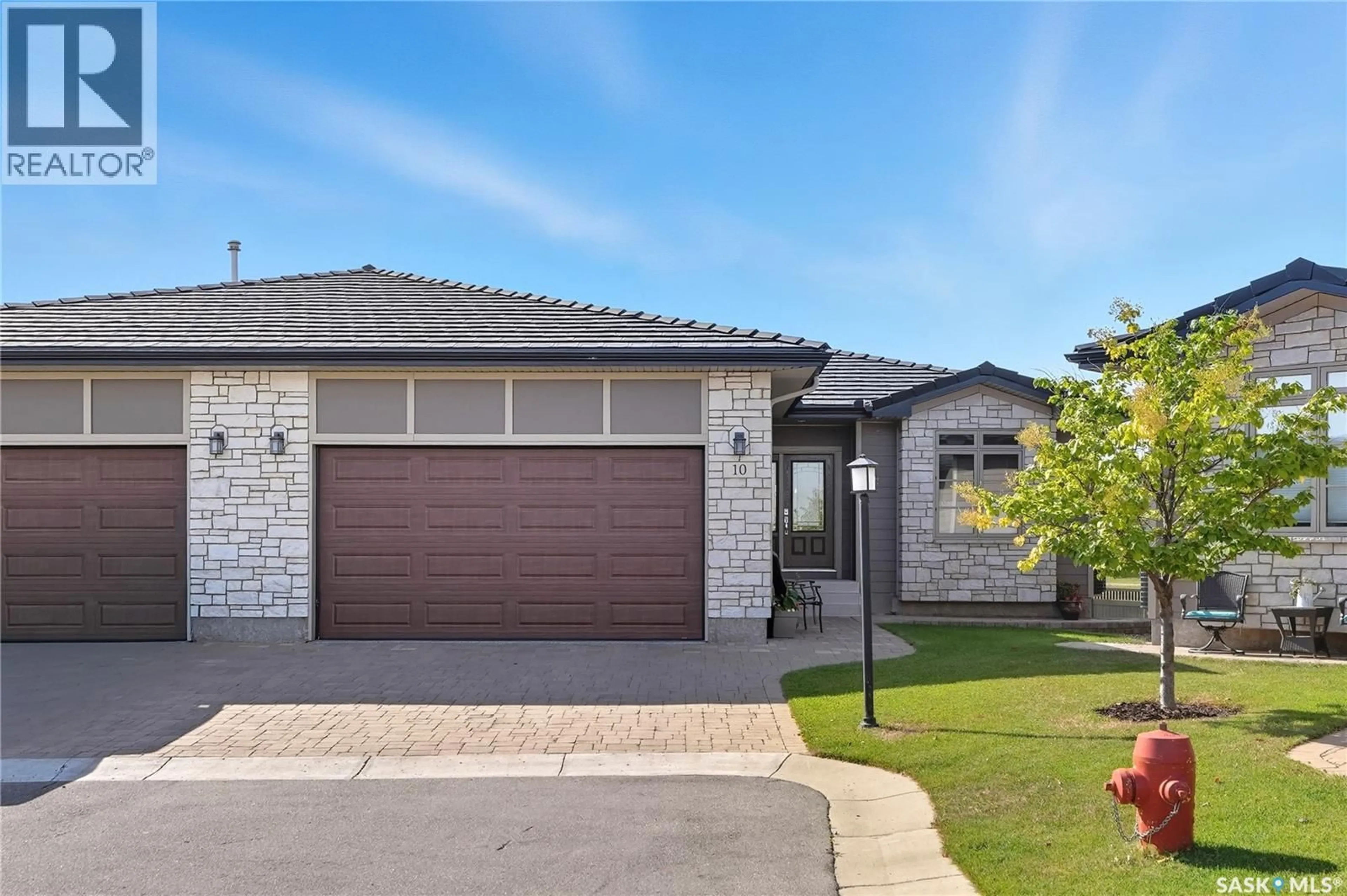 Home with brick exterior material, street for 315 - 10 LEDINGHAM DRIVE, Saskatoon Saskatchewan S7V0J1