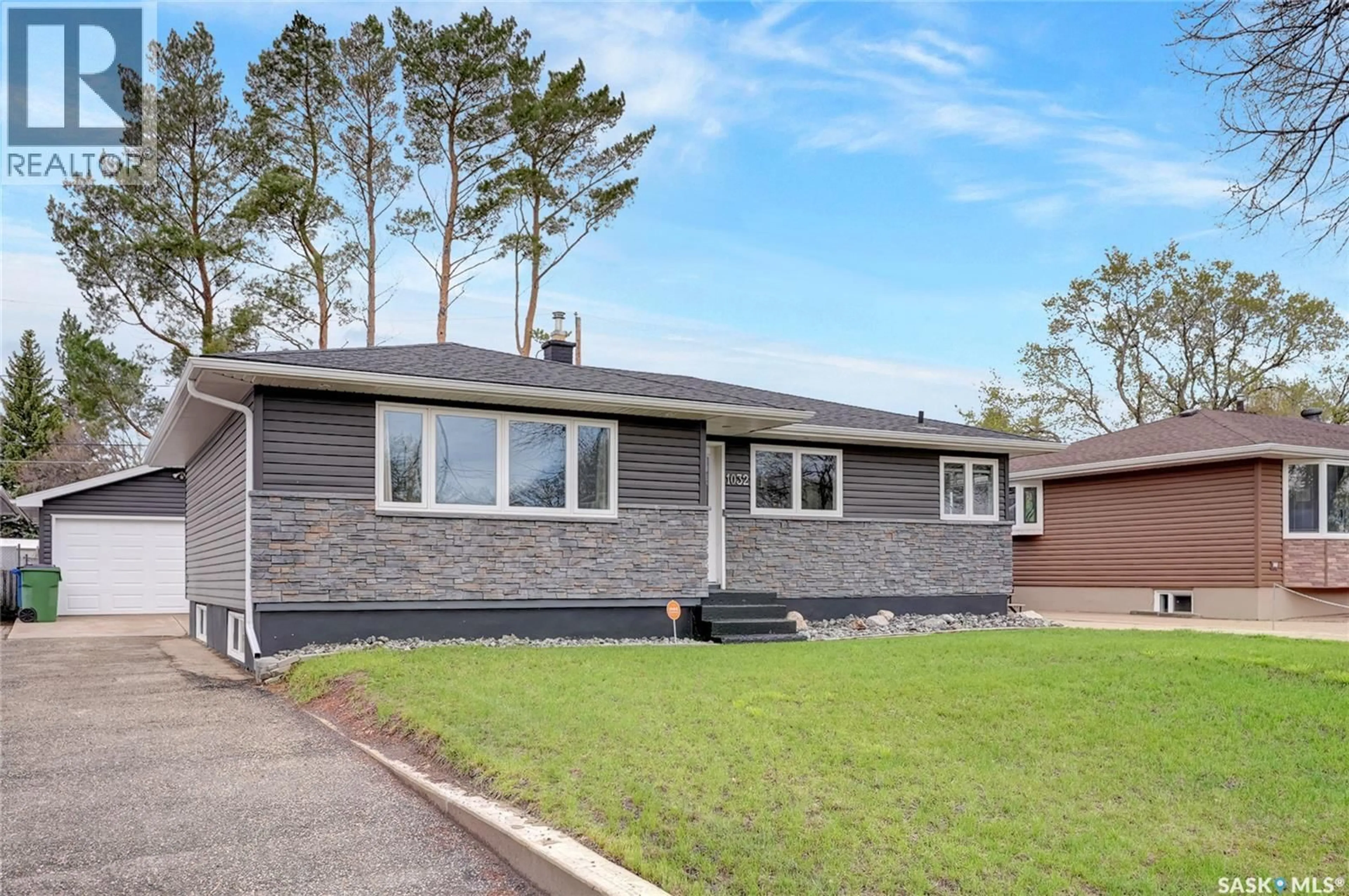 Home with vinyl exterior material, street for 1032 13TH AVENUE, Moose Jaw Saskatchewan S6H4N4