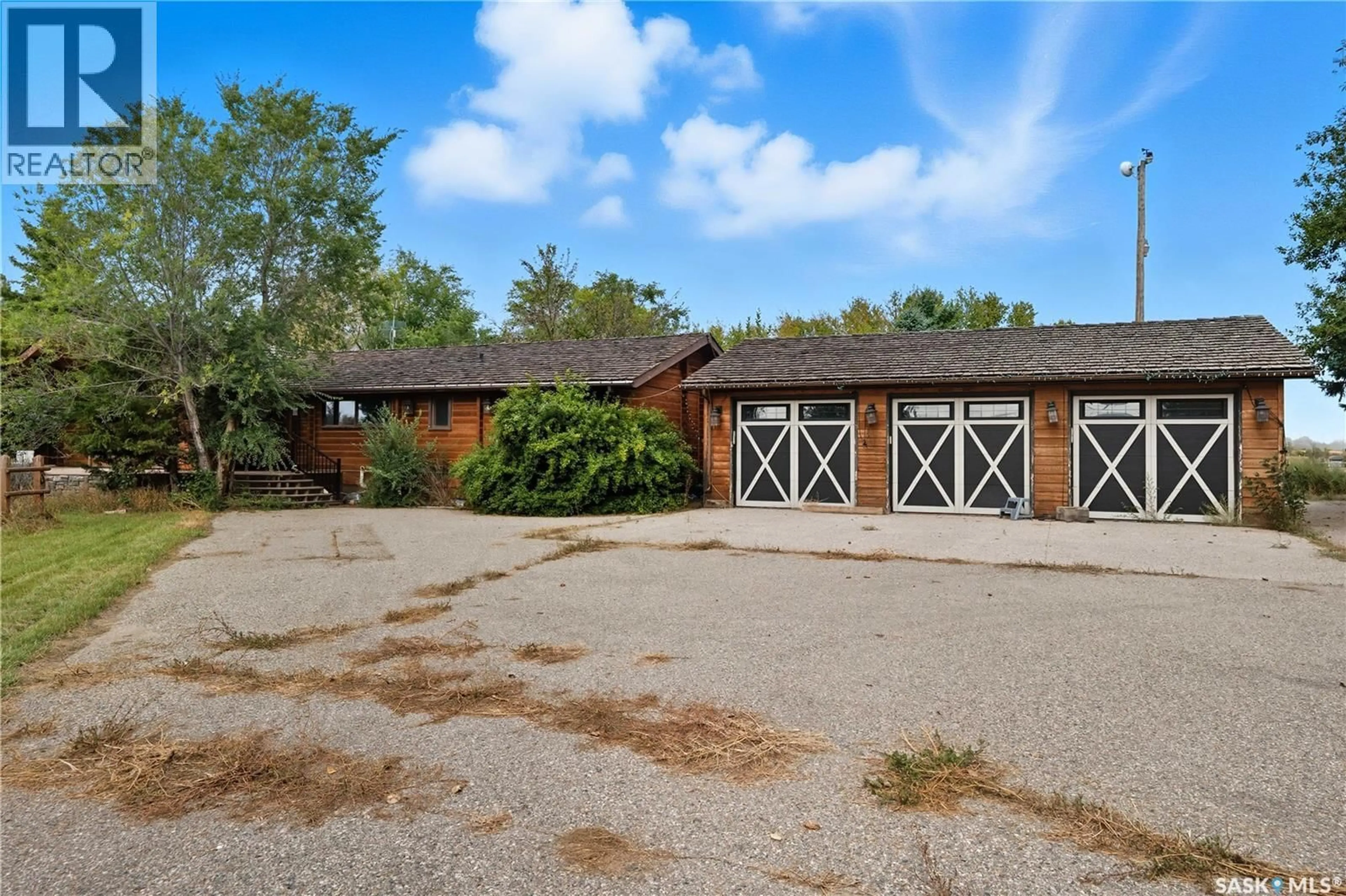 A pic from outside/outdoor area/front of a property/back of a property/a pic from drone, unknown for REED ACREAGE, Edenwold Rm No.158 Saskatchewan S4L5B1