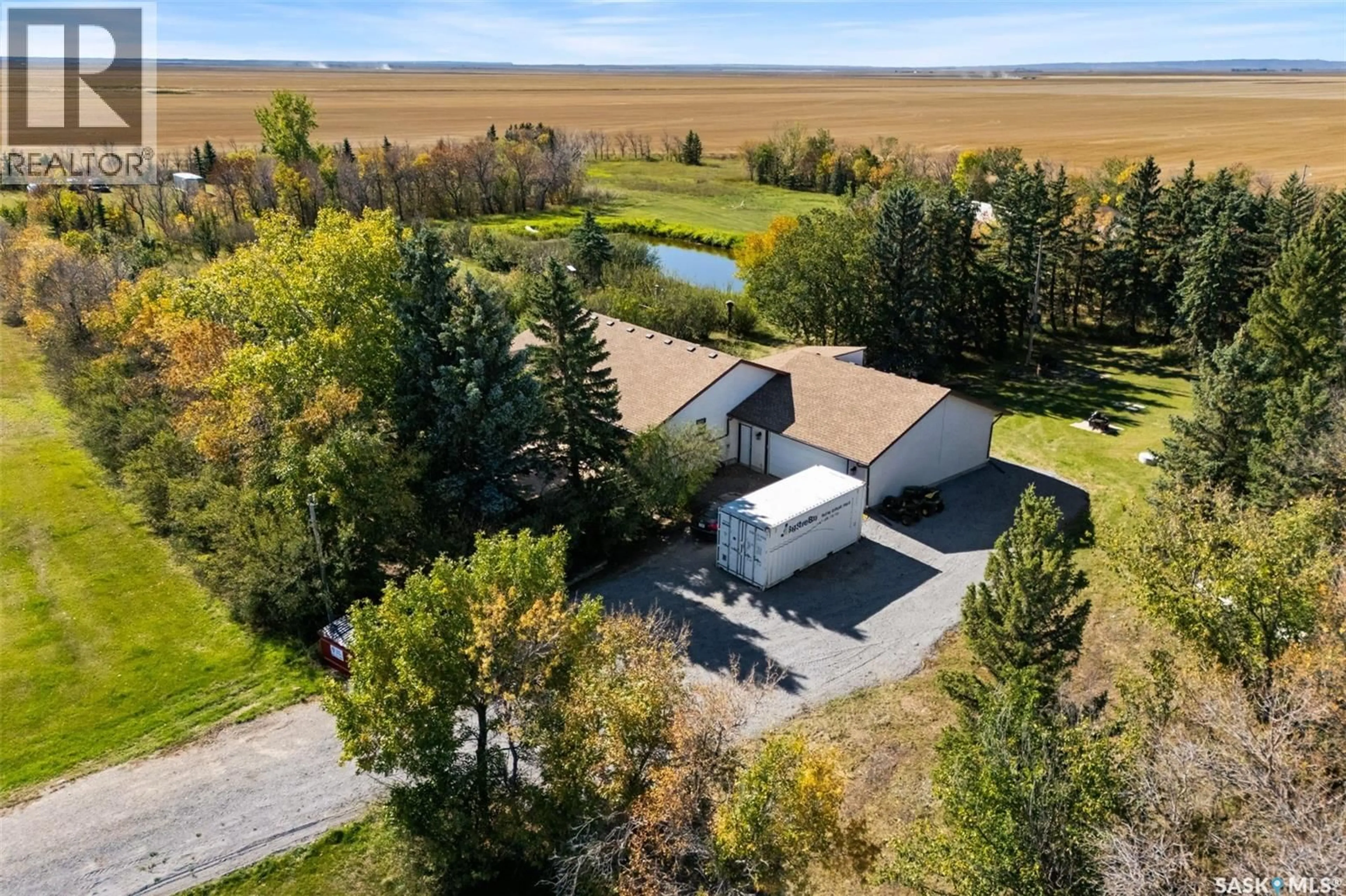 A pic from outside/outdoor area/front of a property/back of a property/a pic from drone, water/lake/river/ocean view for JOHANNSEN ACREAGE, Bratt's Lake Rm No. 129 Saskatchewan S0G5E0