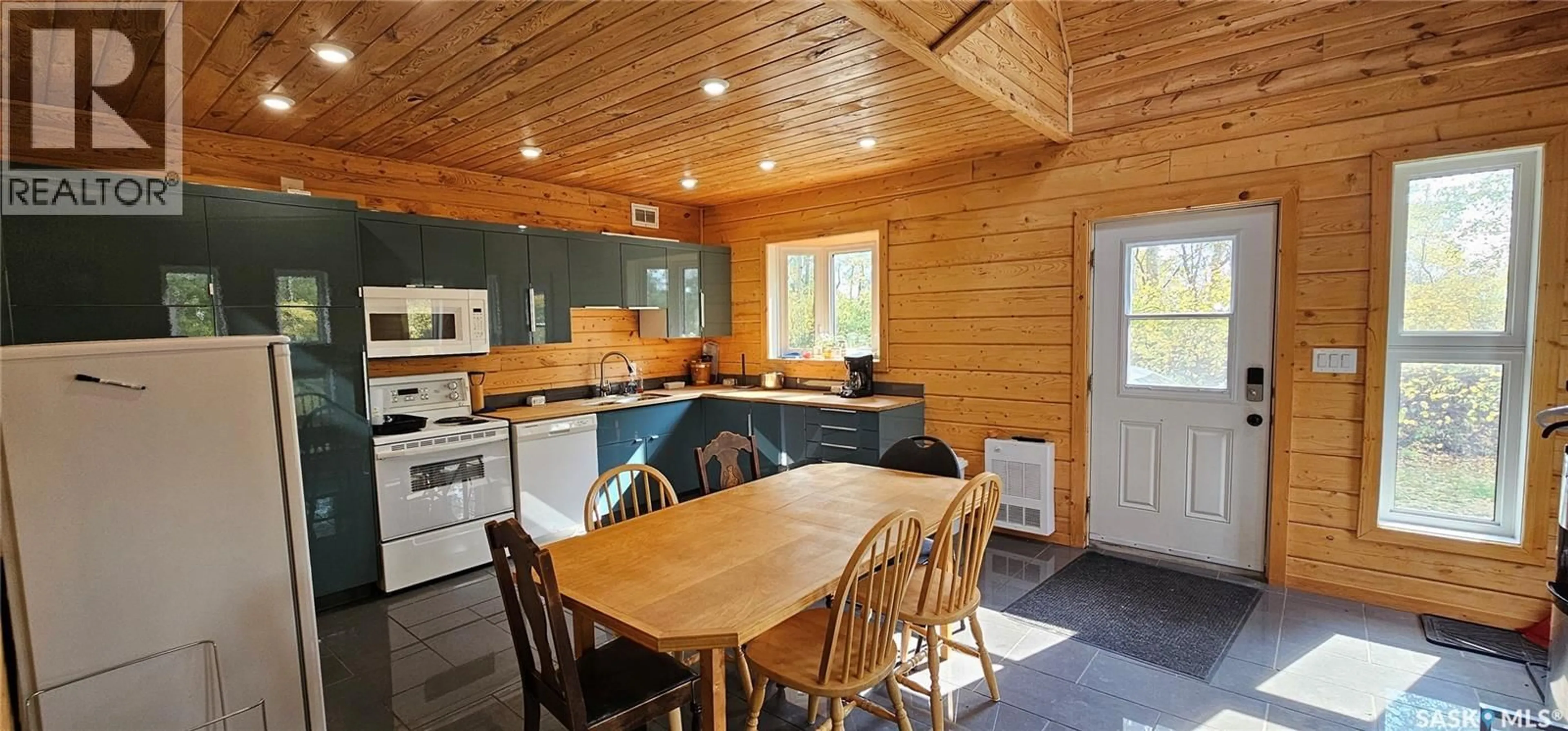 Open concept kitchen, wood/laminate floor for 404 LAKEVIEW ROAD, Barrier Valley Rm No. 397 Saskatchewan S0E0B0