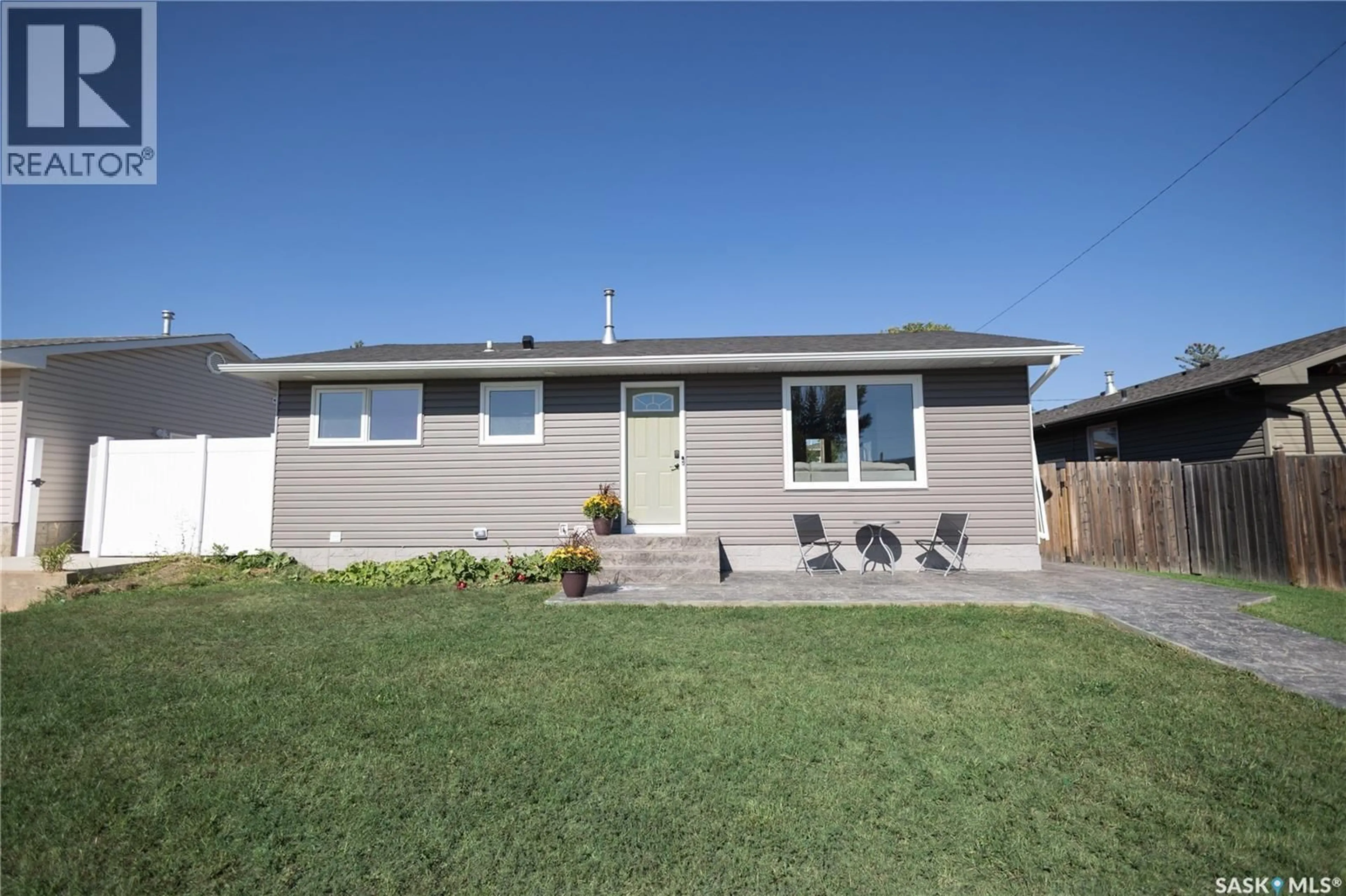 Home with vinyl exterior material, street for 1308 STADACONA STREET, Moose Jaw Saskatchewan S6H6M9