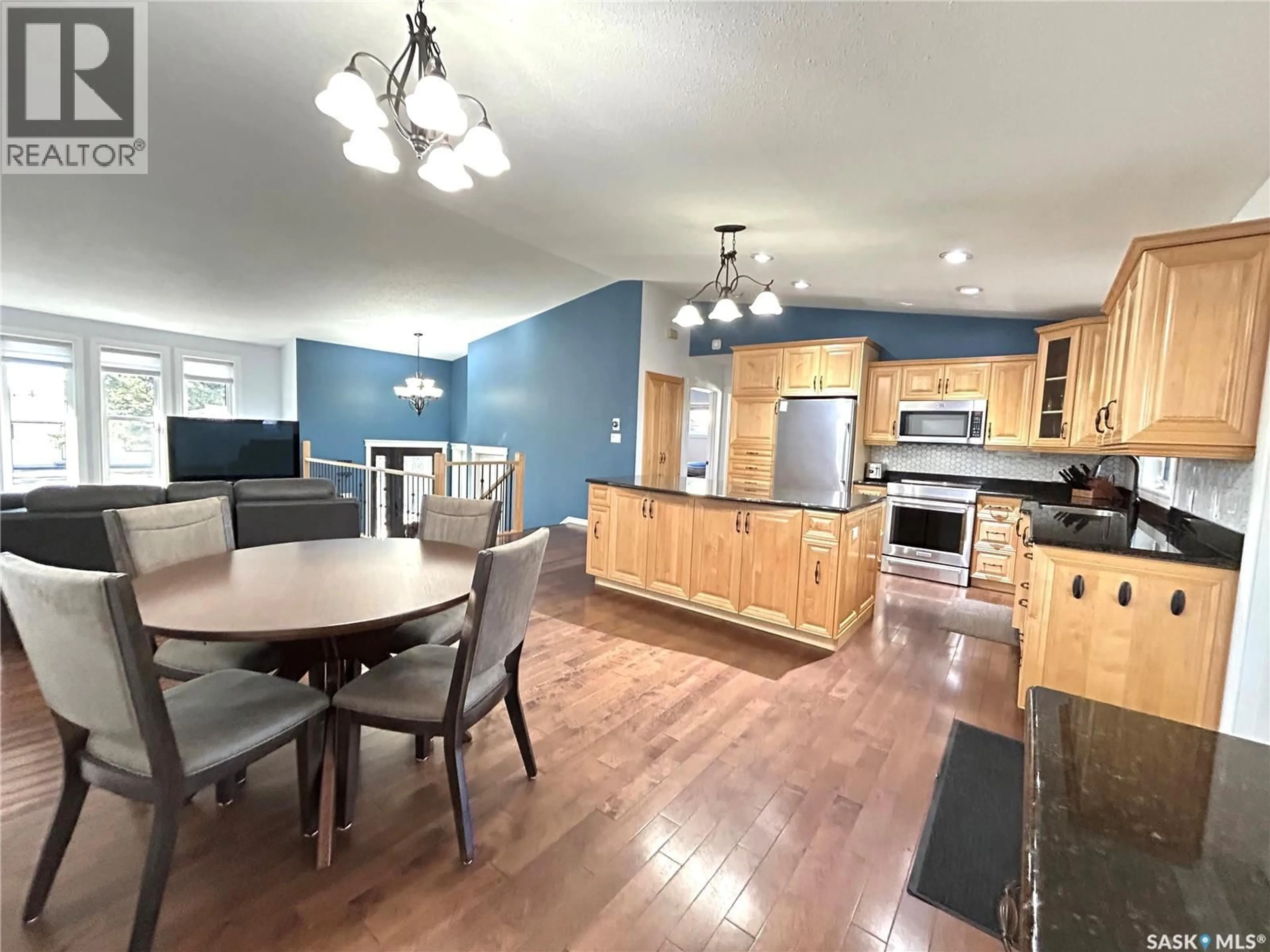 Open concept kitchen, wood/laminate floor for 210 SCHAEFER STREET, Richmound Saskatchewan S0N2E0