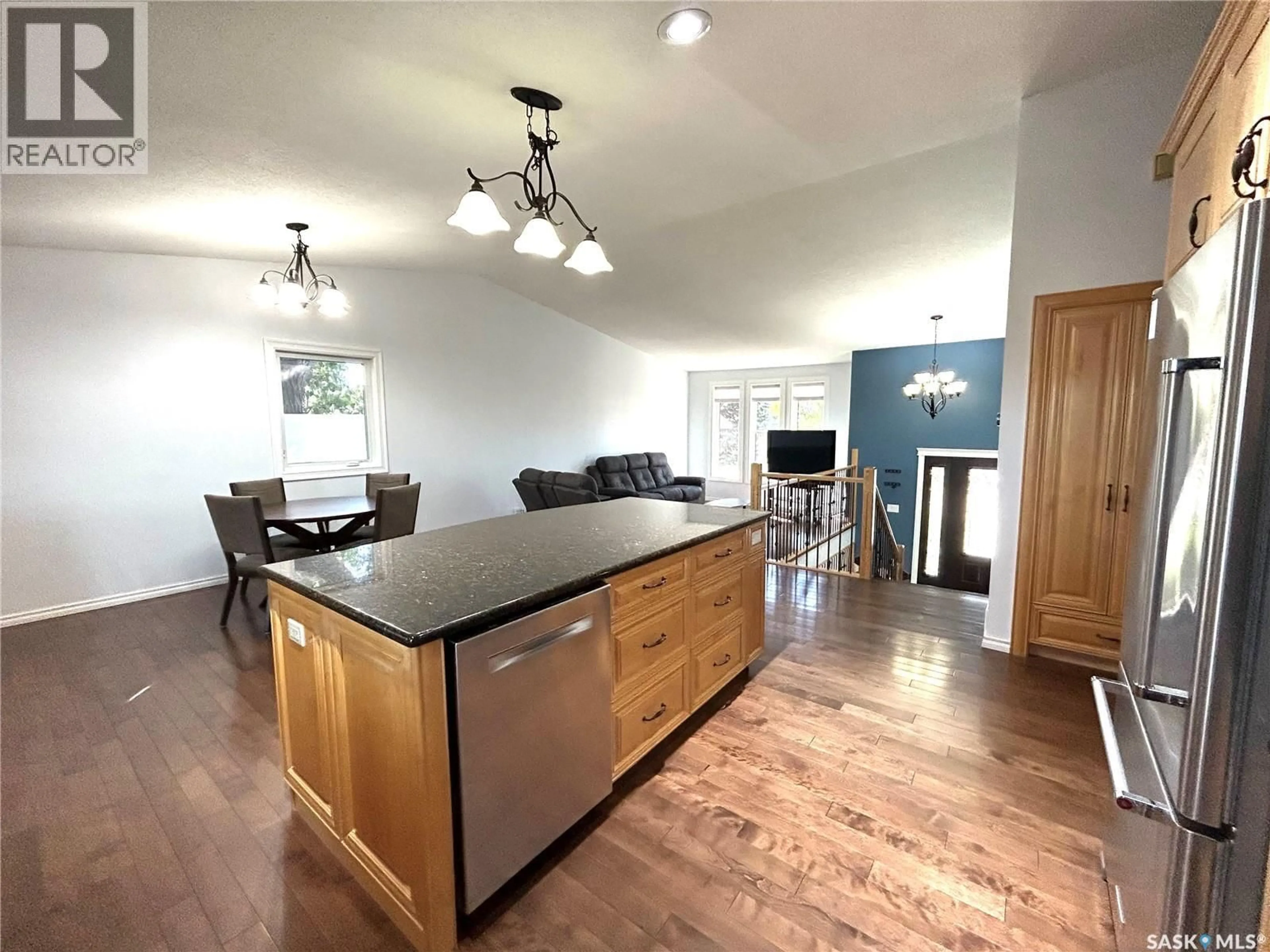 Open concept kitchen, wood/laminate floor for 210 SCHAEFER STREET, Richmound Saskatchewan S0N2E0