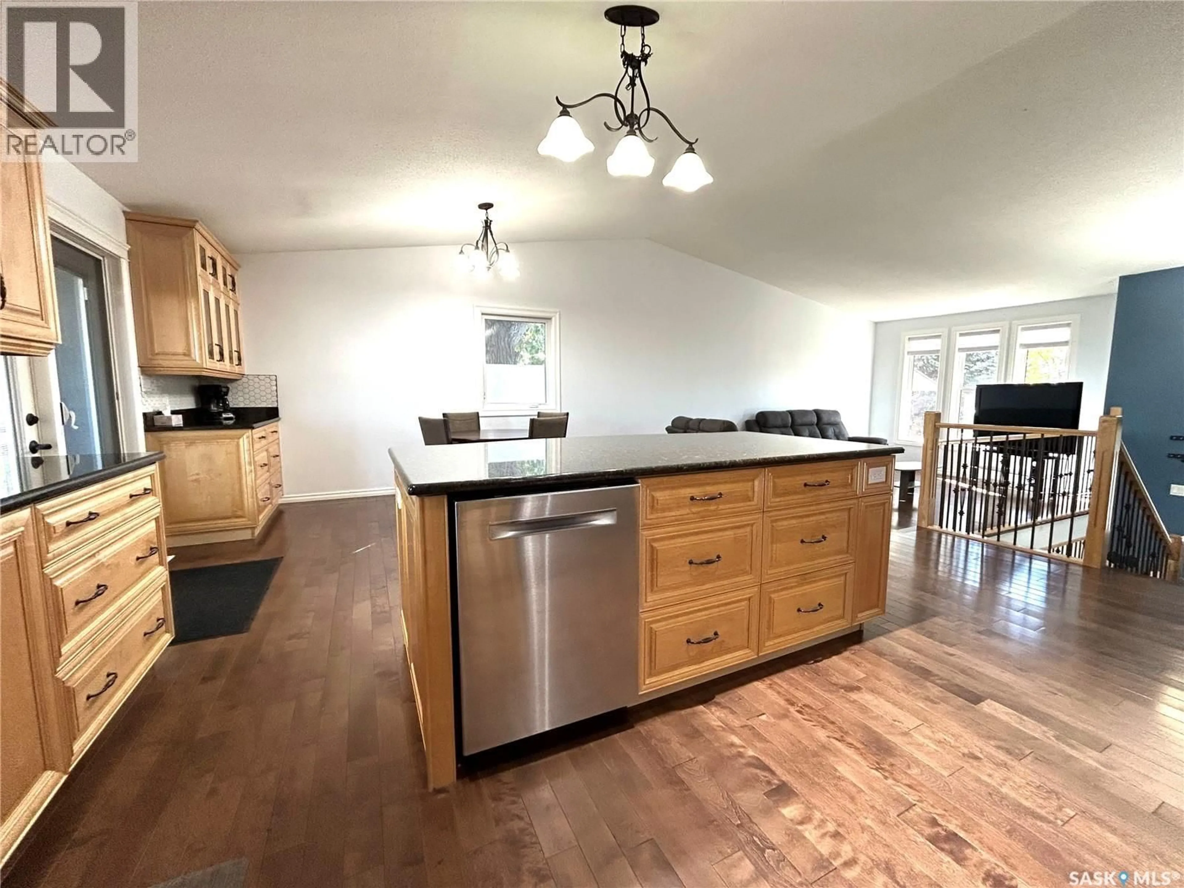 Open concept kitchen, wood/laminate floor for 210 SCHAEFER STREET, Richmound Saskatchewan S0N2E0