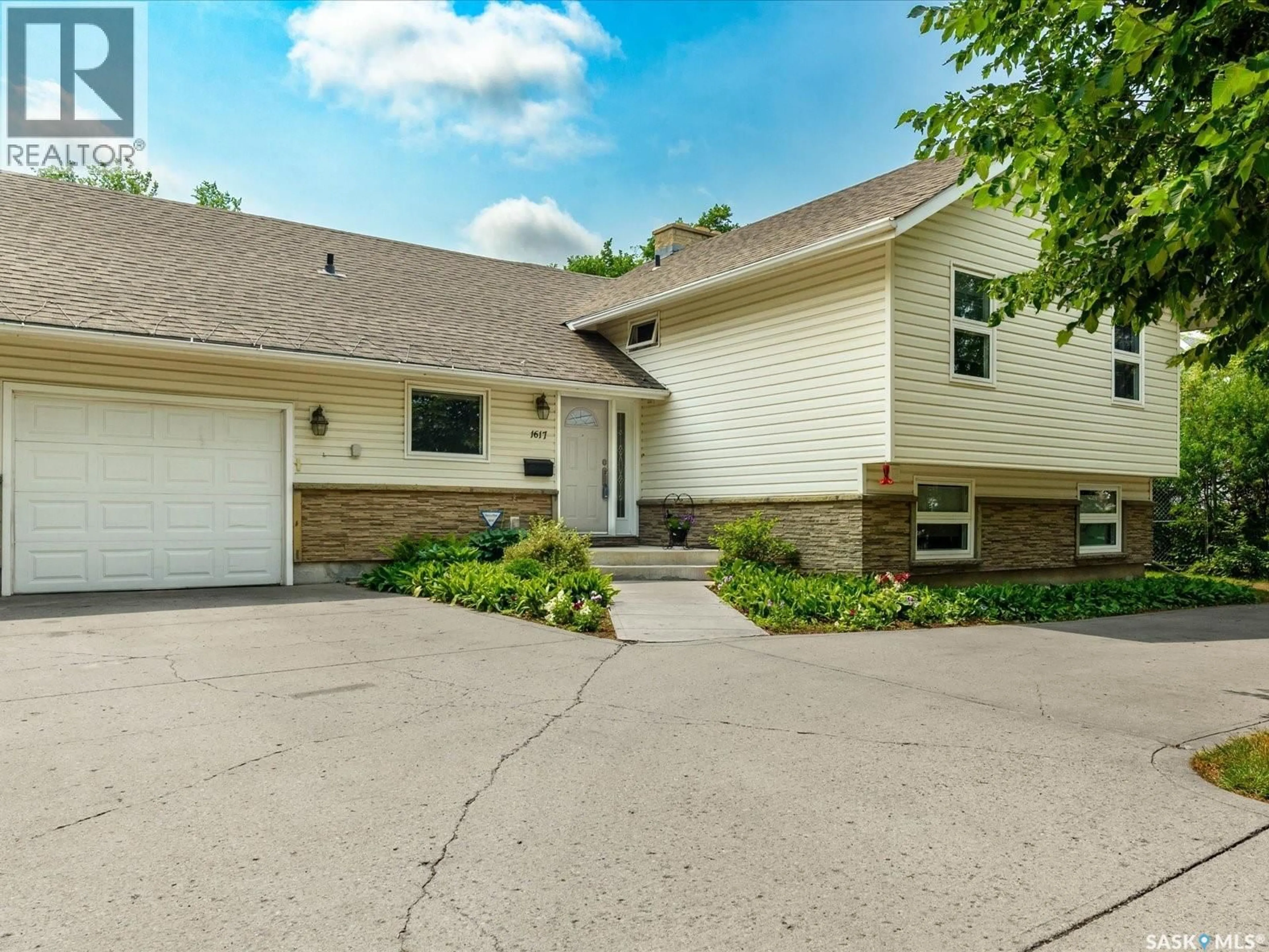 Home with vinyl exterior material, street for 1617 6TH AVENUE, Regina Saskatchewan S4R0M6