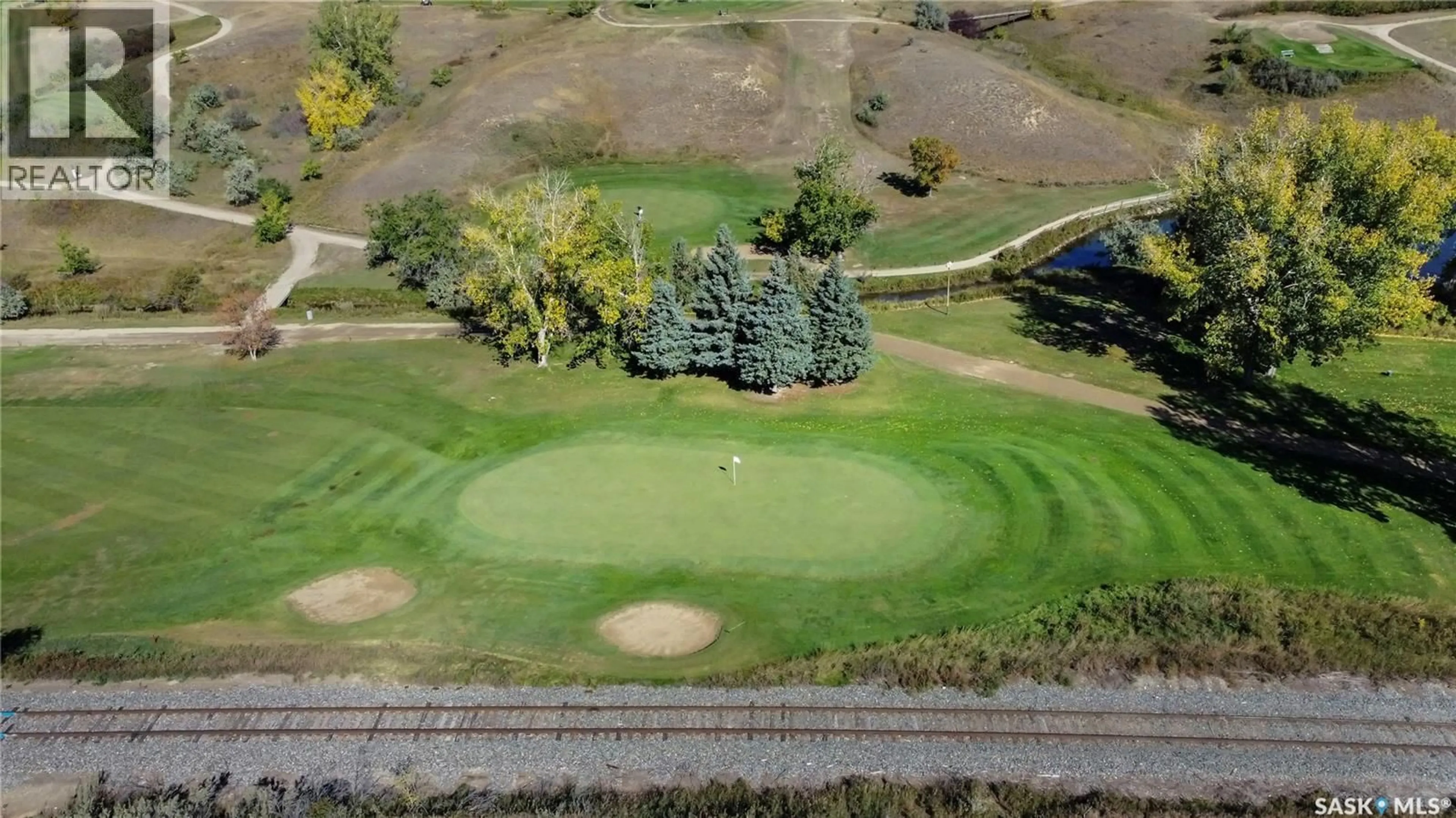 A pic from outside/outdoor area/front of a property/back of a property/a pic from drone, unknown for 1 COPPER RIDGE WAY, Moose Jaw Saskatchewan S6H4R1